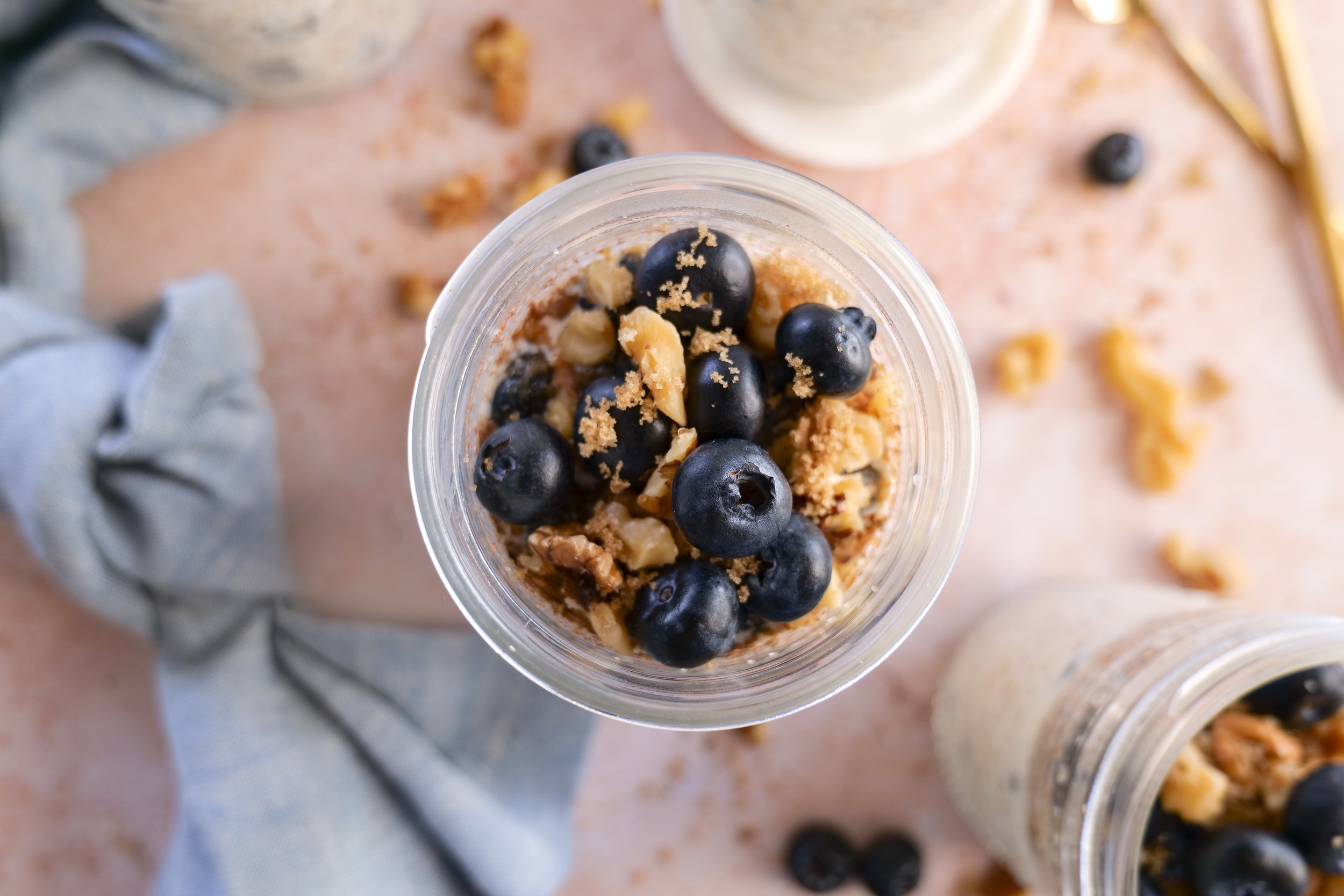 Healthy blueberry overnight oatmeal jars prepared for meal prep breakfasts.