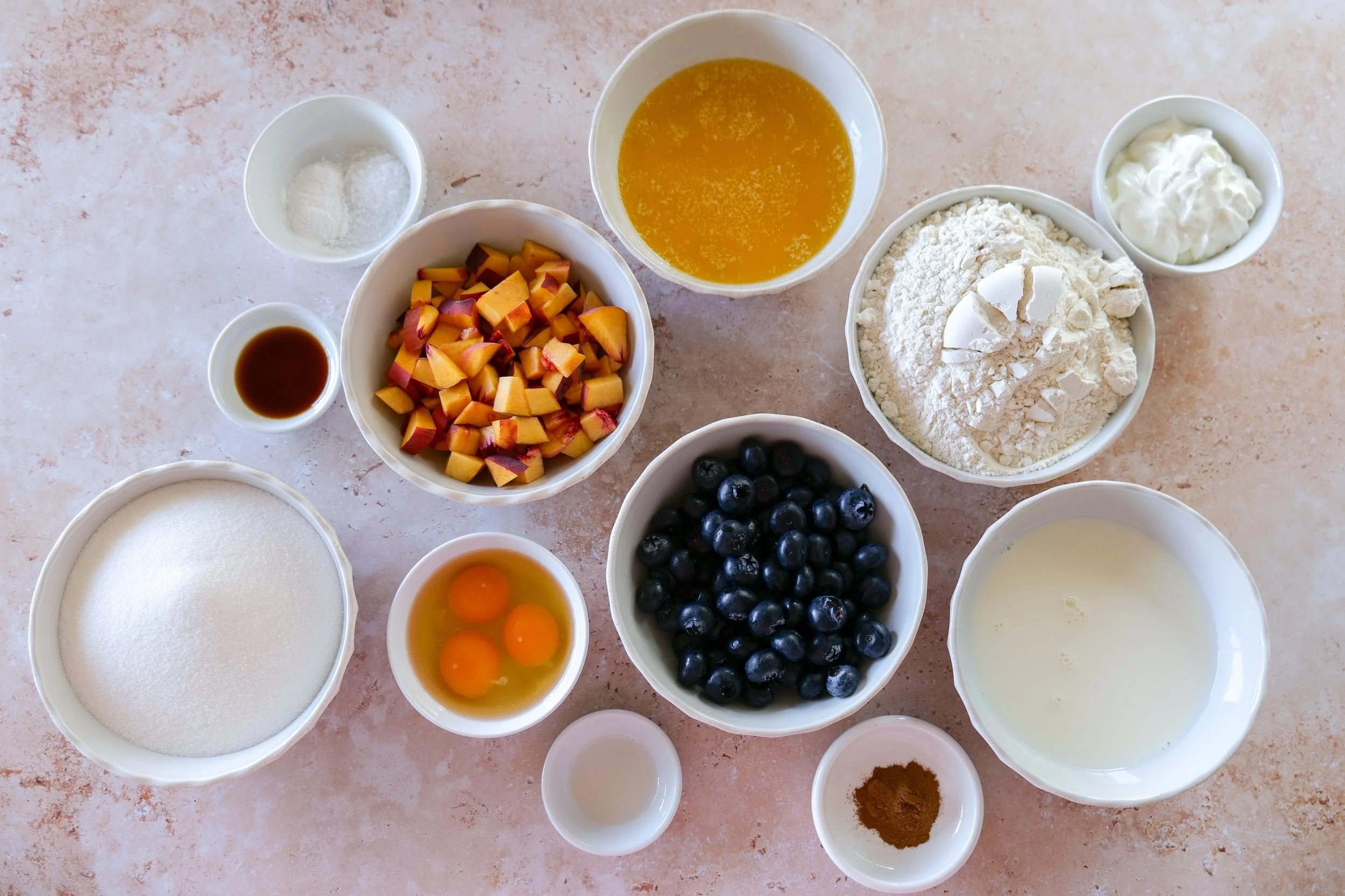 Mixing the batter for homemade Blueberry Peach Bread before adding fresh fruit.