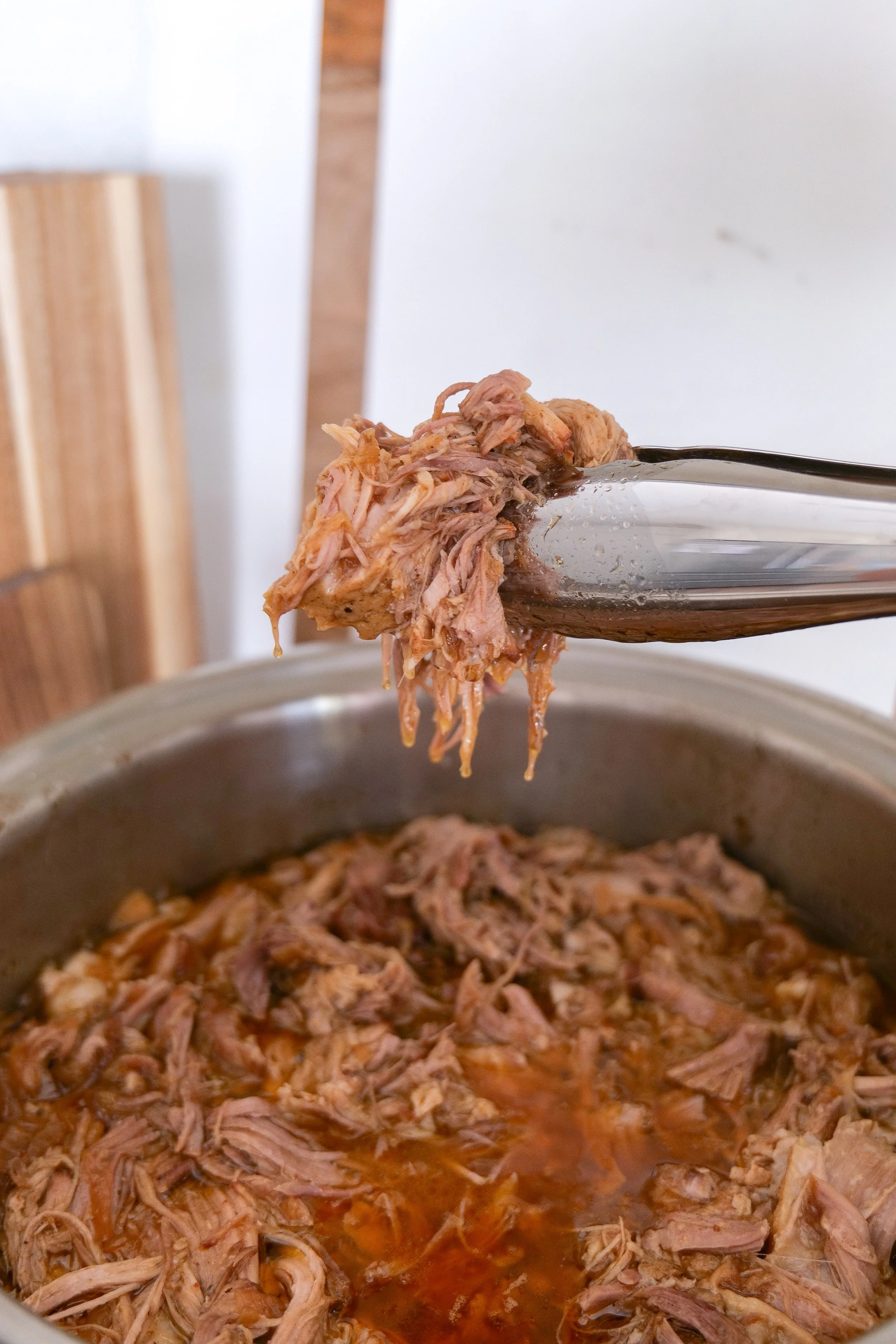 Tender pulled pork made with a homemade brown sugar, paprika and cumin dry rub.