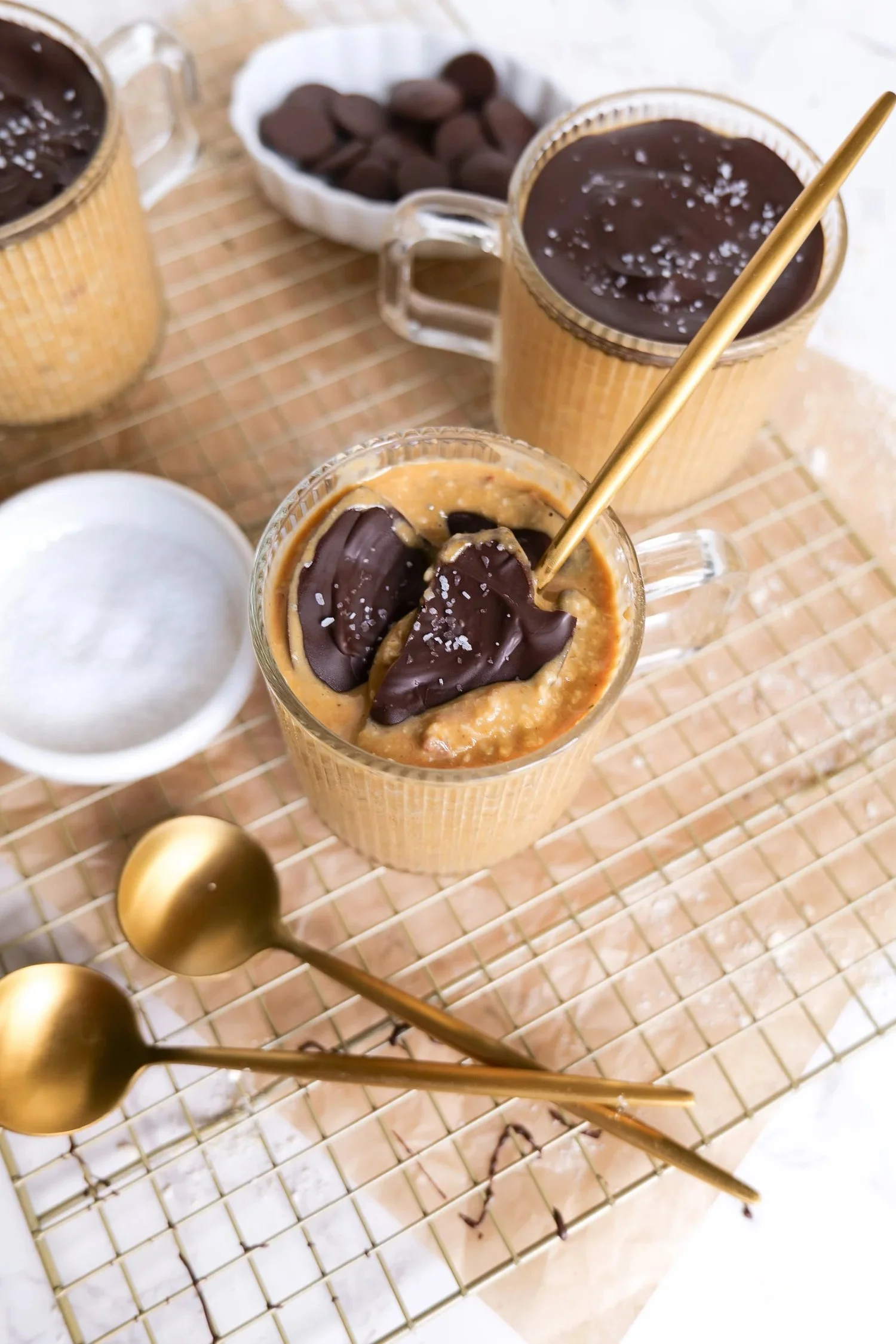 Pumpkin pie overnight oats topped with a hard chocolate shell.