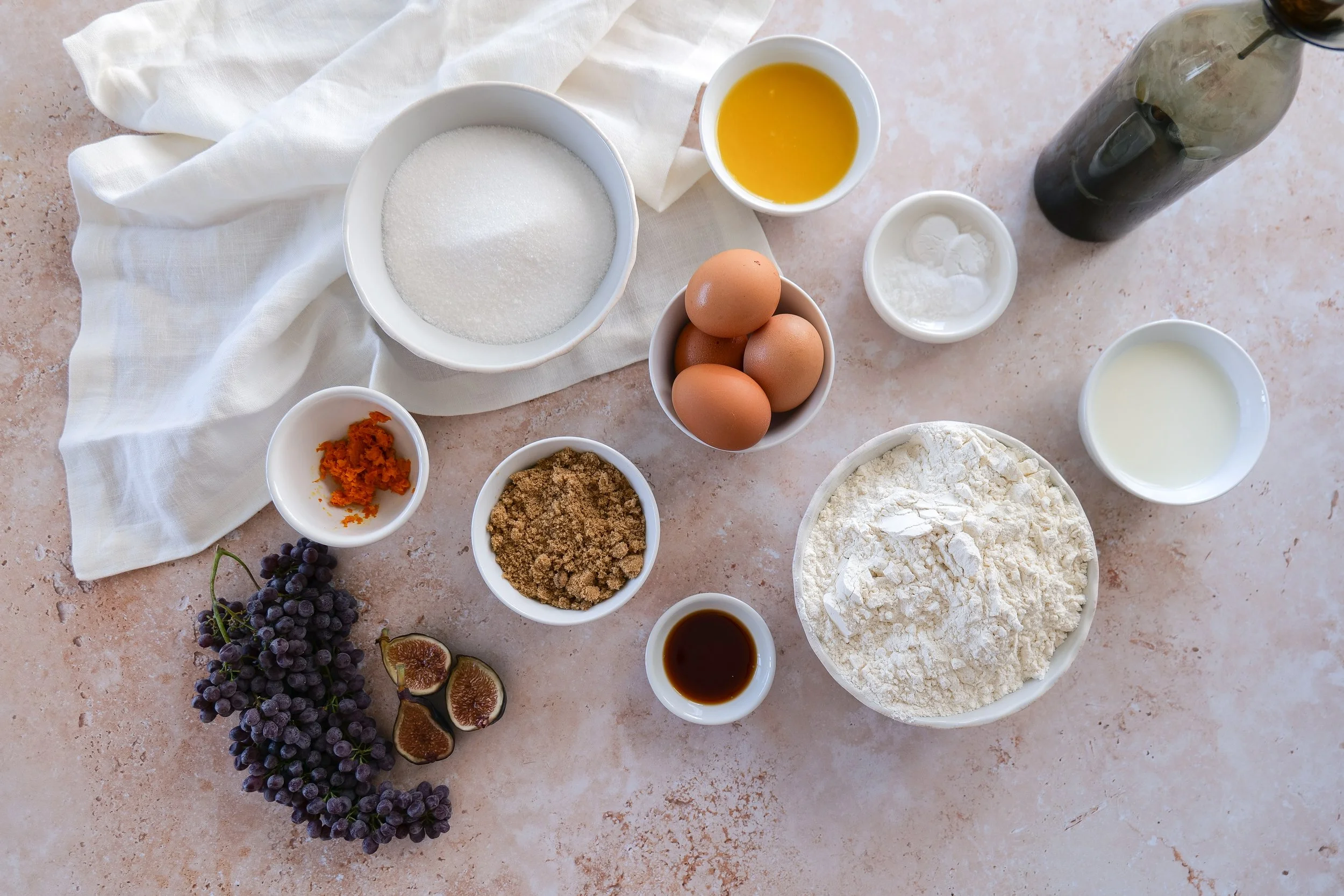 Ingredients for orange olive oil cake with mascarpone cream and fresh fruit