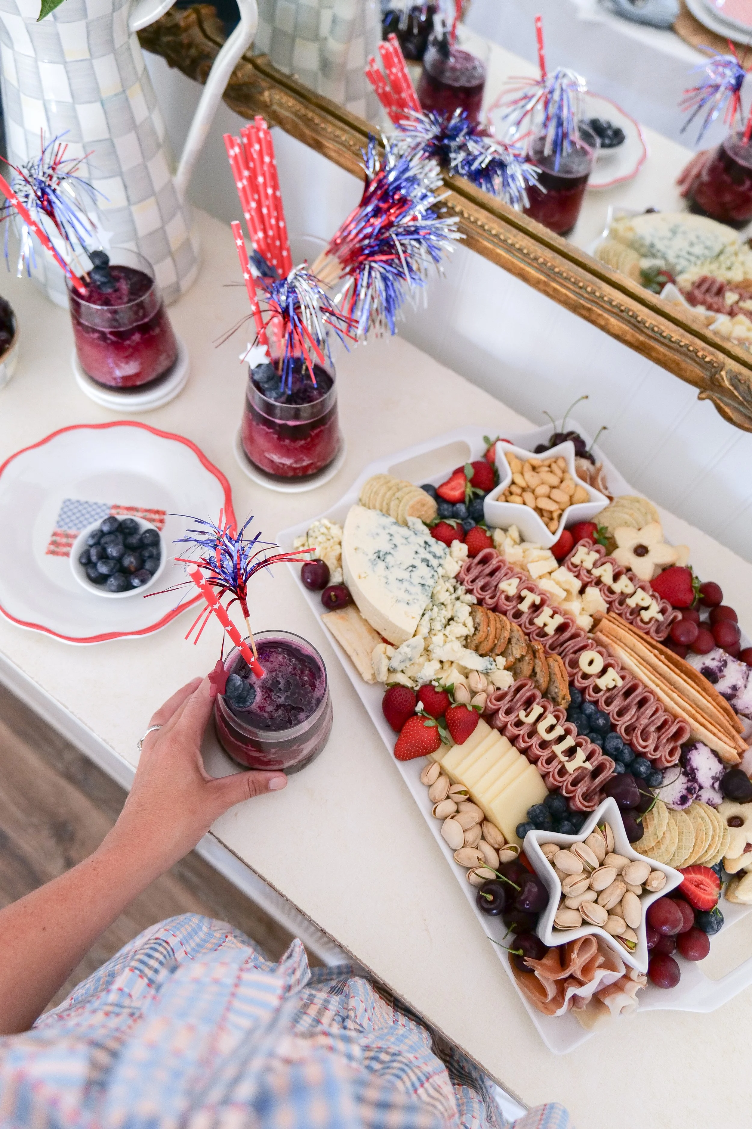 Red, white, and blue appetizer board for Fourth of July entertaining.
