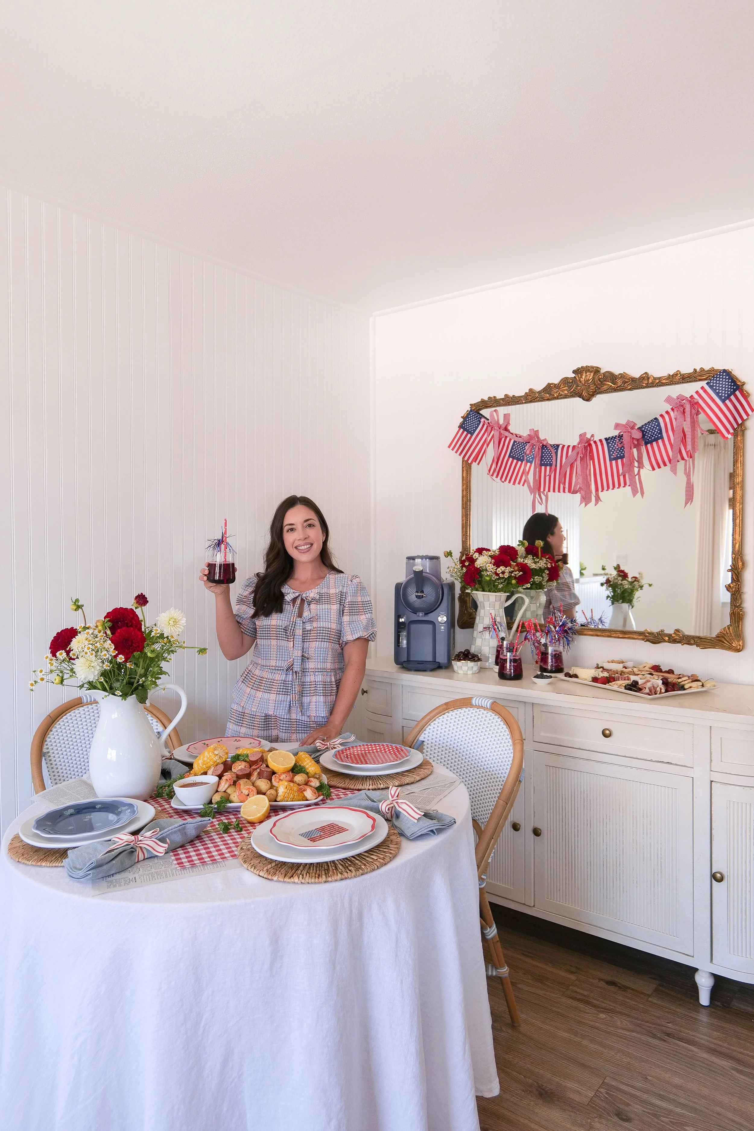 Shrimp boil and festive charcuterie board displayed for summer entertaining.
