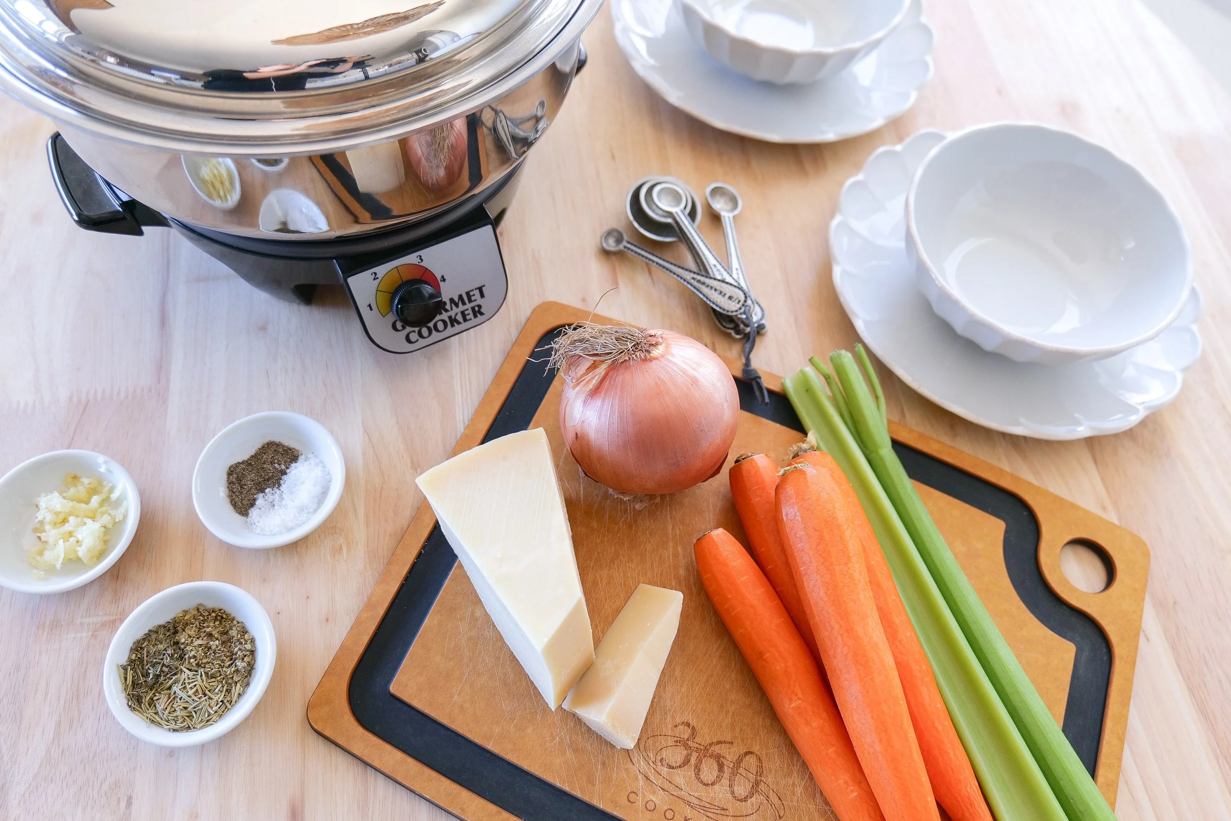 Easy slow cooker Italian soup made with chicken, vegetables, herbs, Parmesan and pastina.