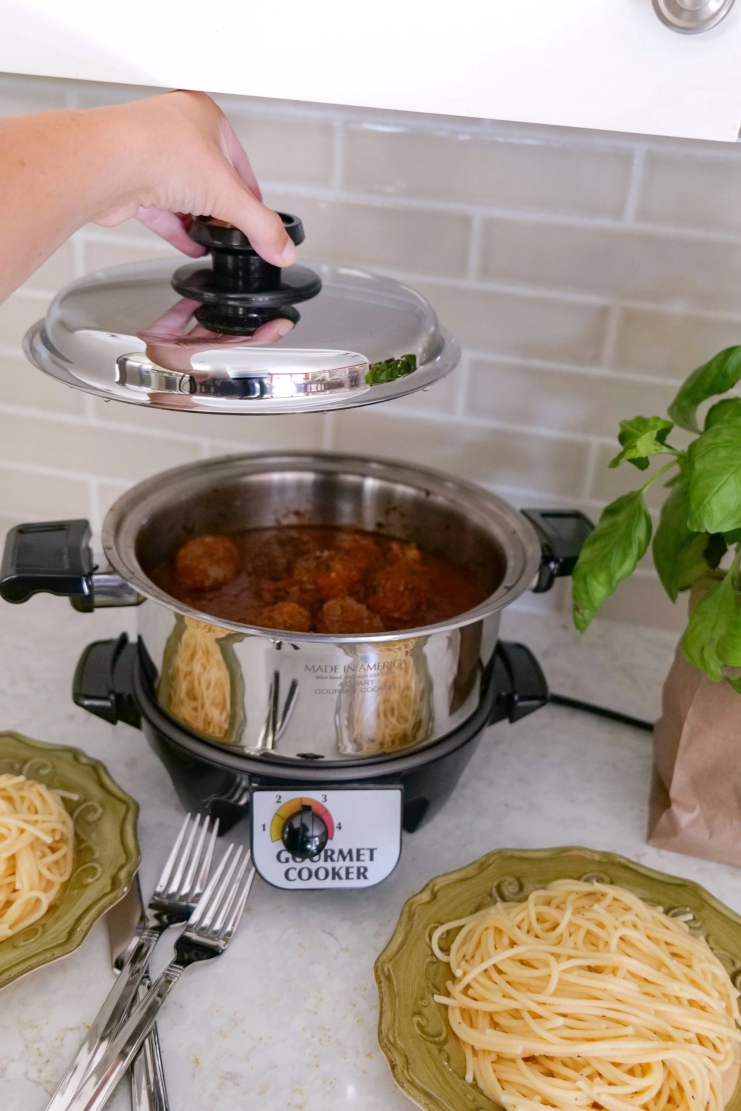 Italian meatballs served over pasta for an easy family dinner