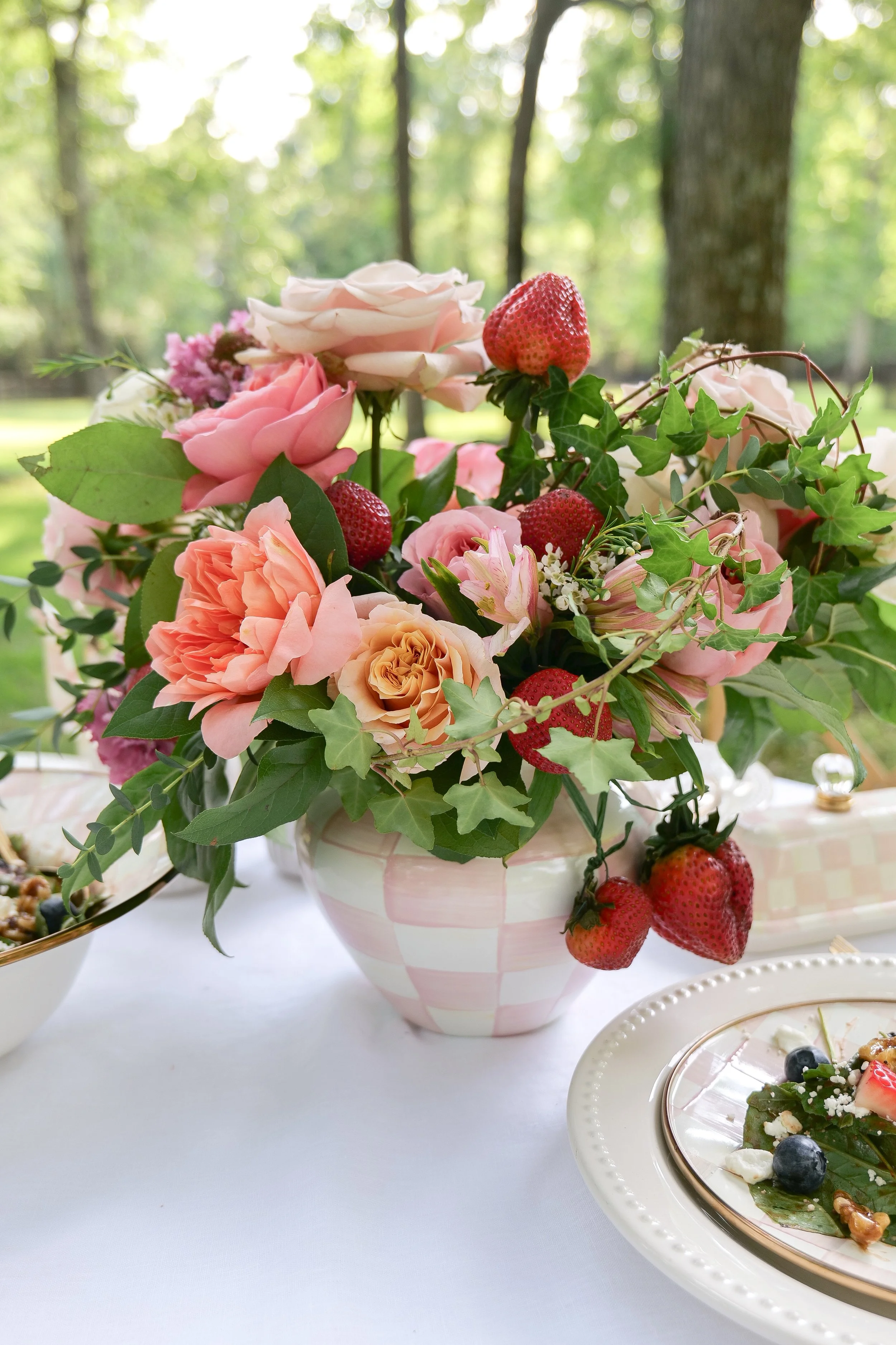 Strawberry garden party centerpiece with flowers