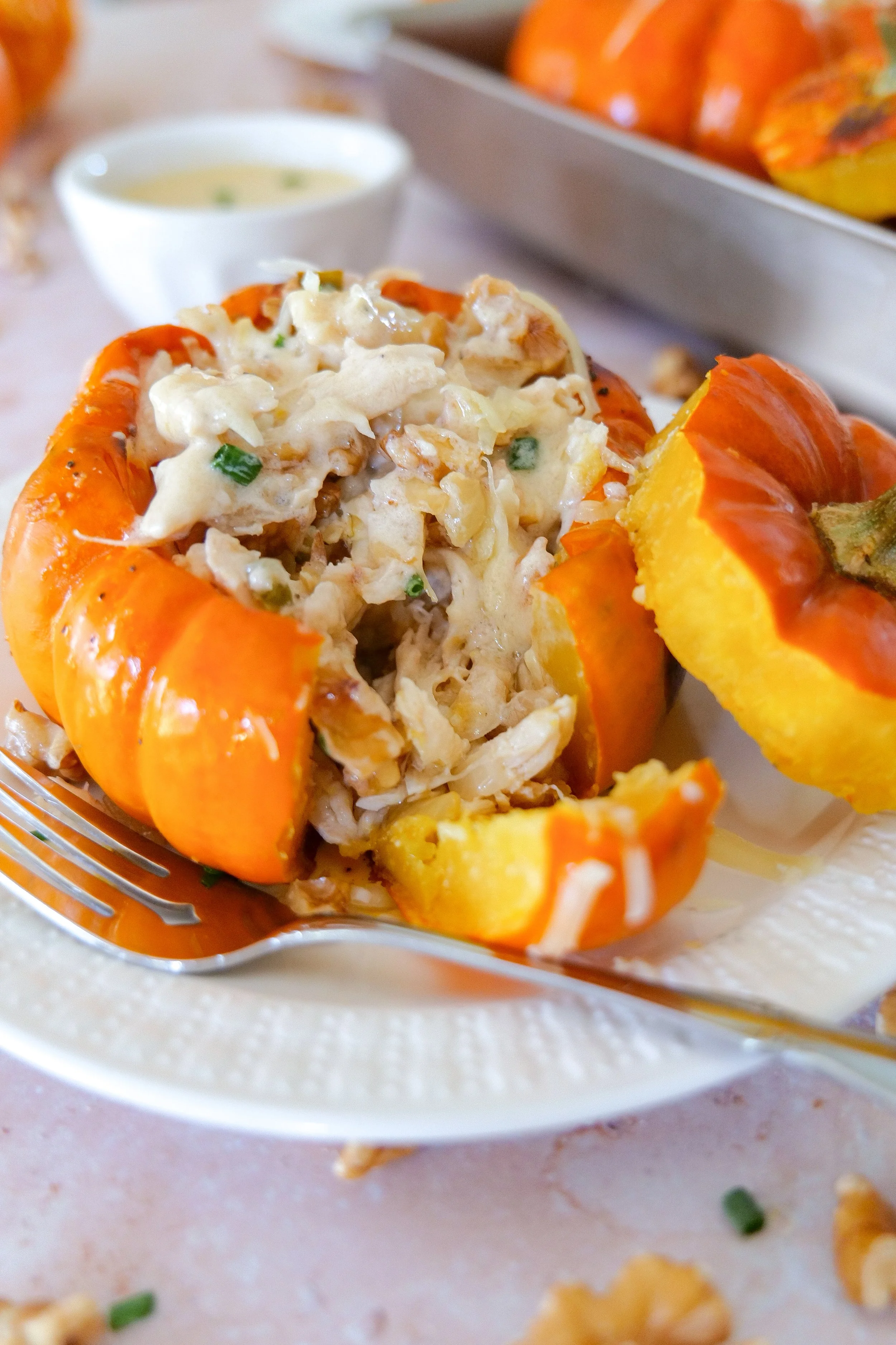 Roasted pumpkin filled with creamy chicken, Gruyère cheese and crunchy walnuts.