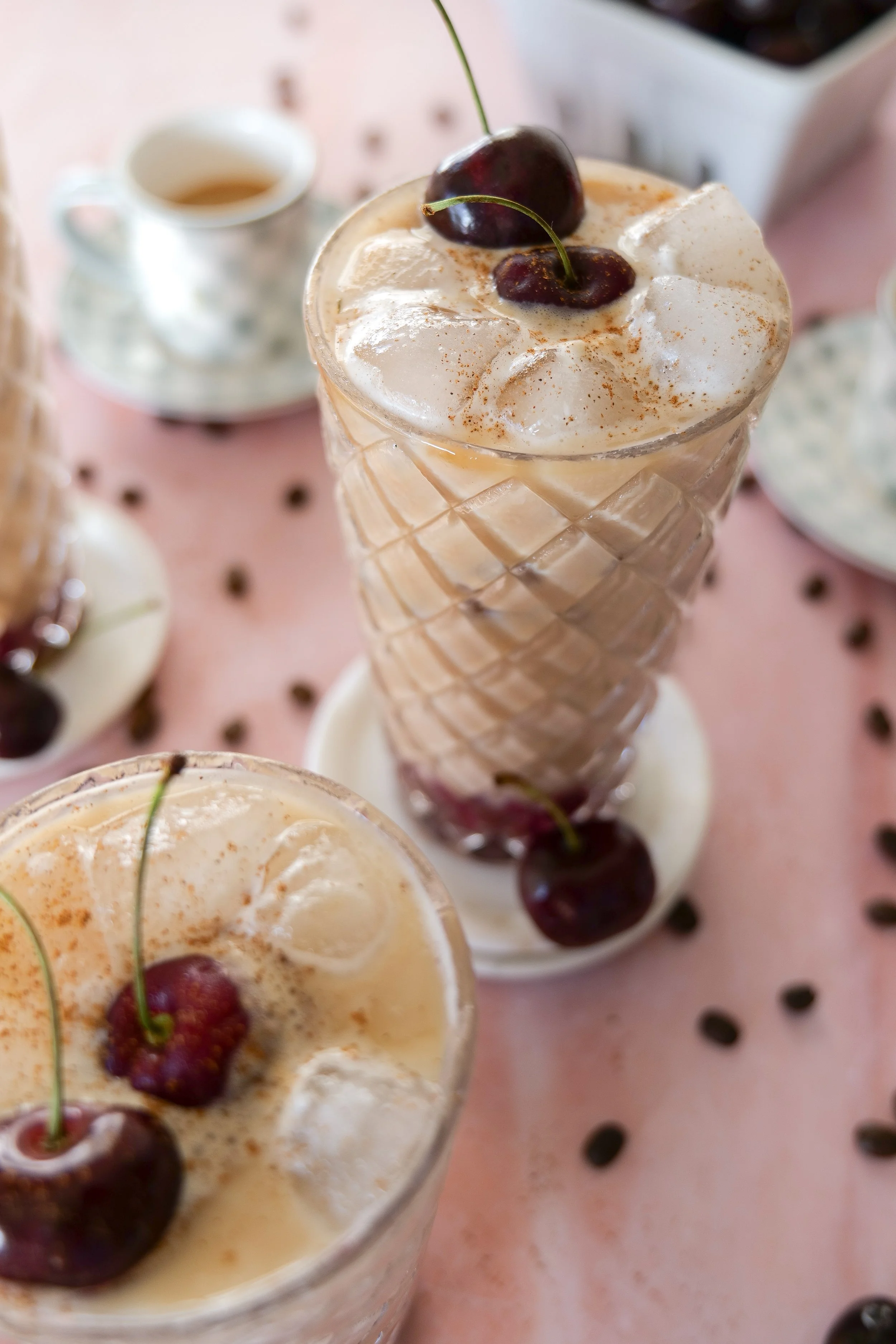 Coffee shop inspired Cherry Cobbler Latte made with espresso, milk, and homemade cherry syrup.