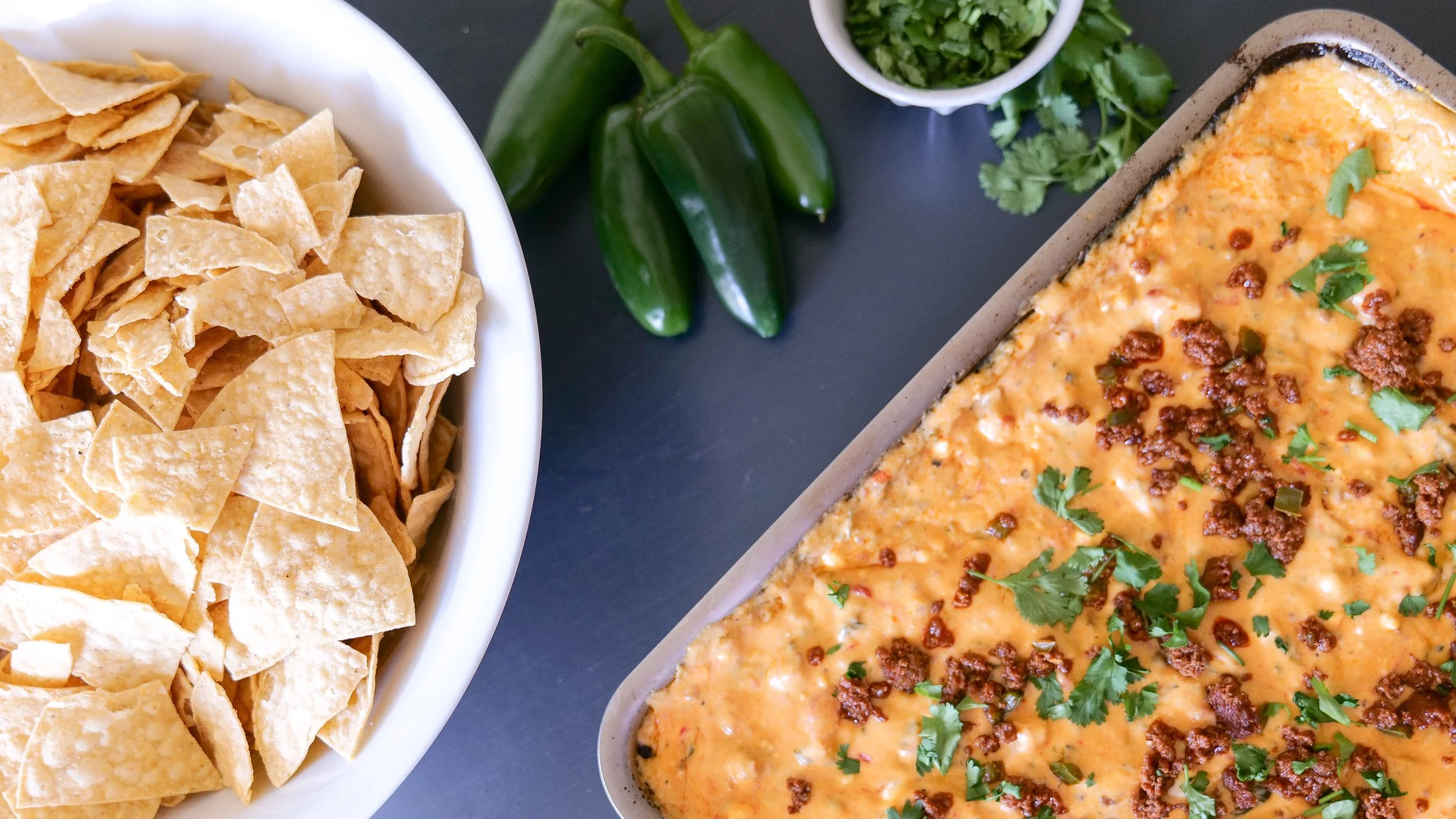 Grilled chorizo queso with jalapeños and melted cheese