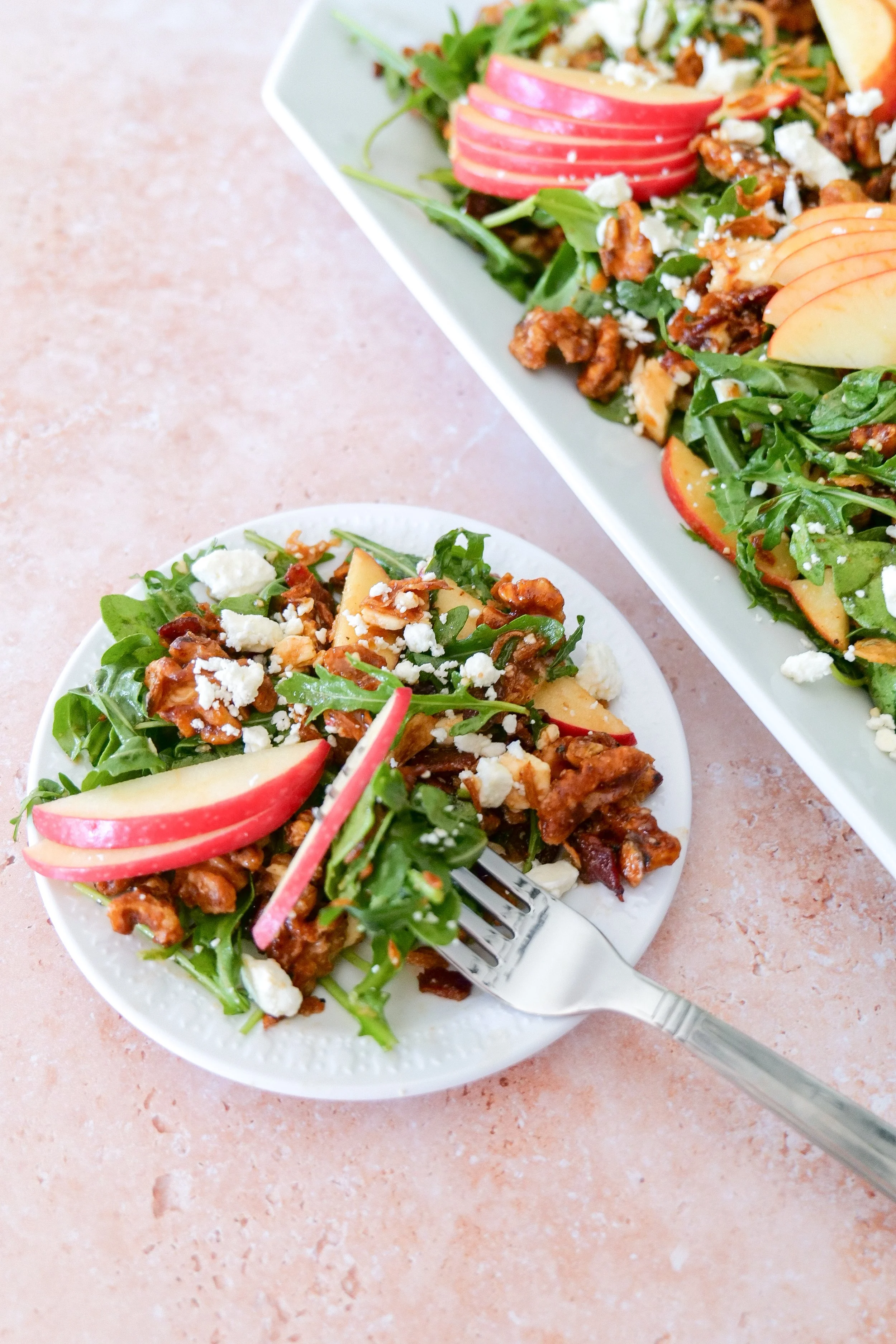 Fresh apple walnut salad with bacon, crumbled feta and crispy shallots over mixed greens.