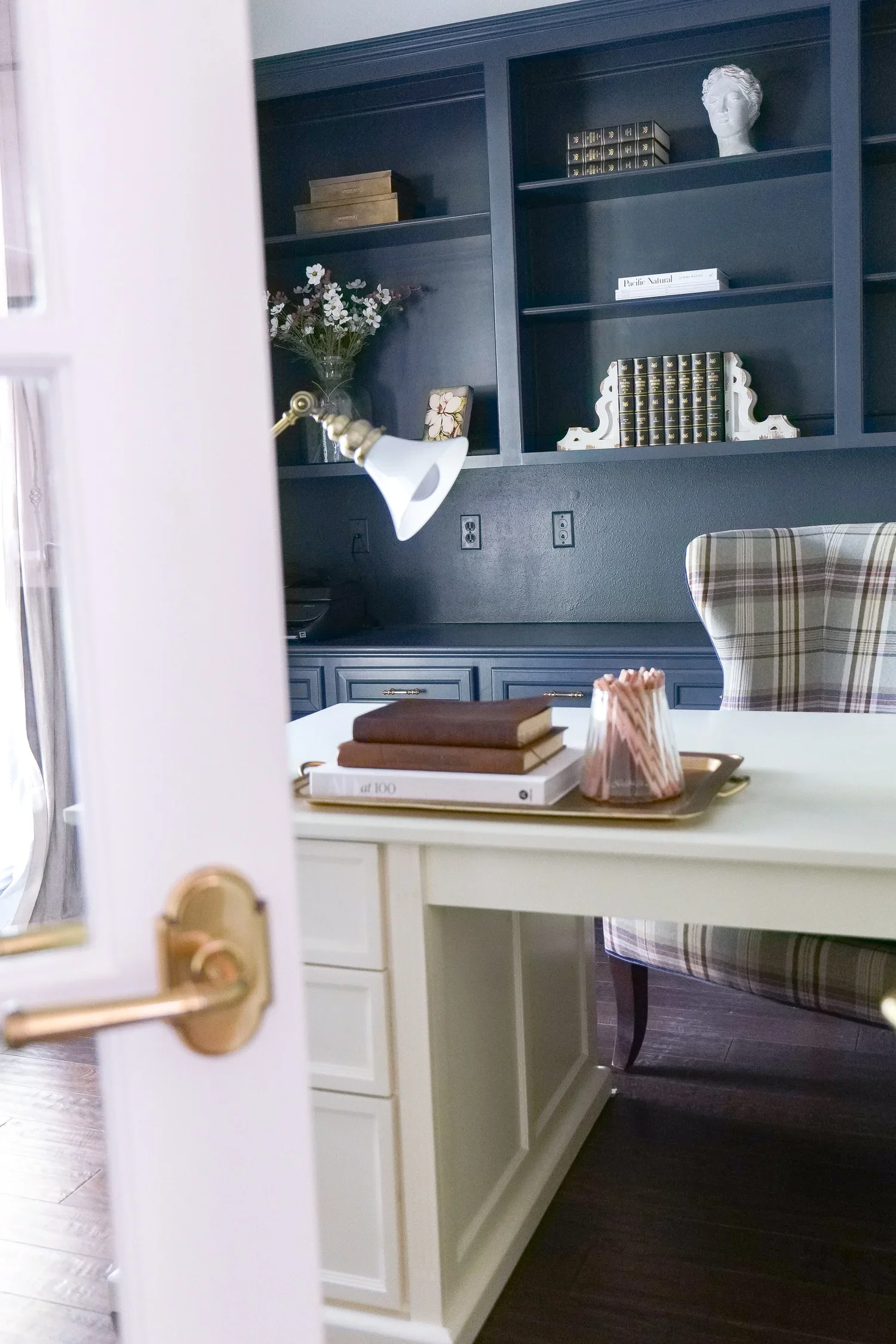 Modern traditional home featuring upgraded interior door hardware with timeless brass finishes.