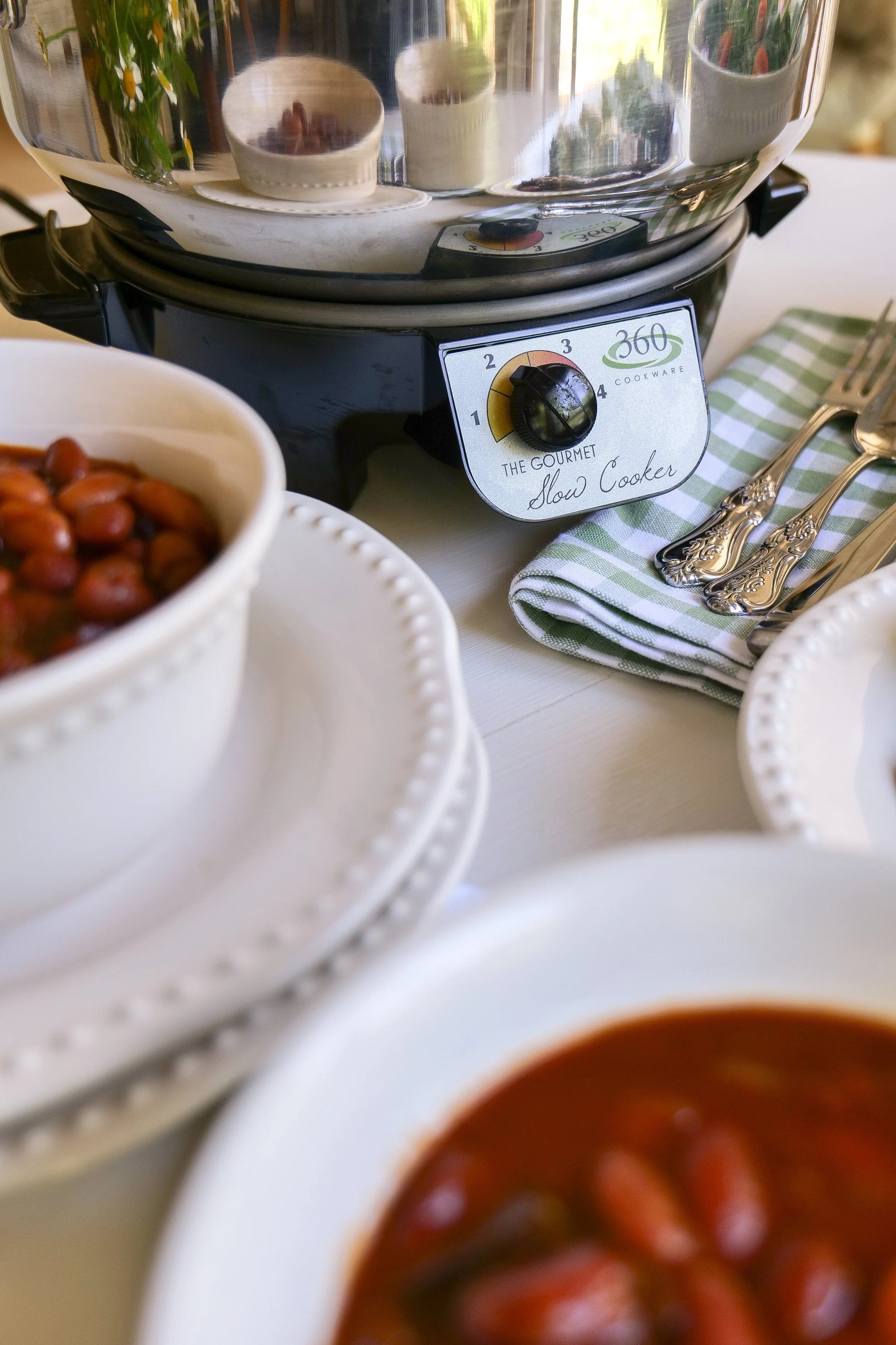 BBQ beans topped with crispy bacon for a summer cookout