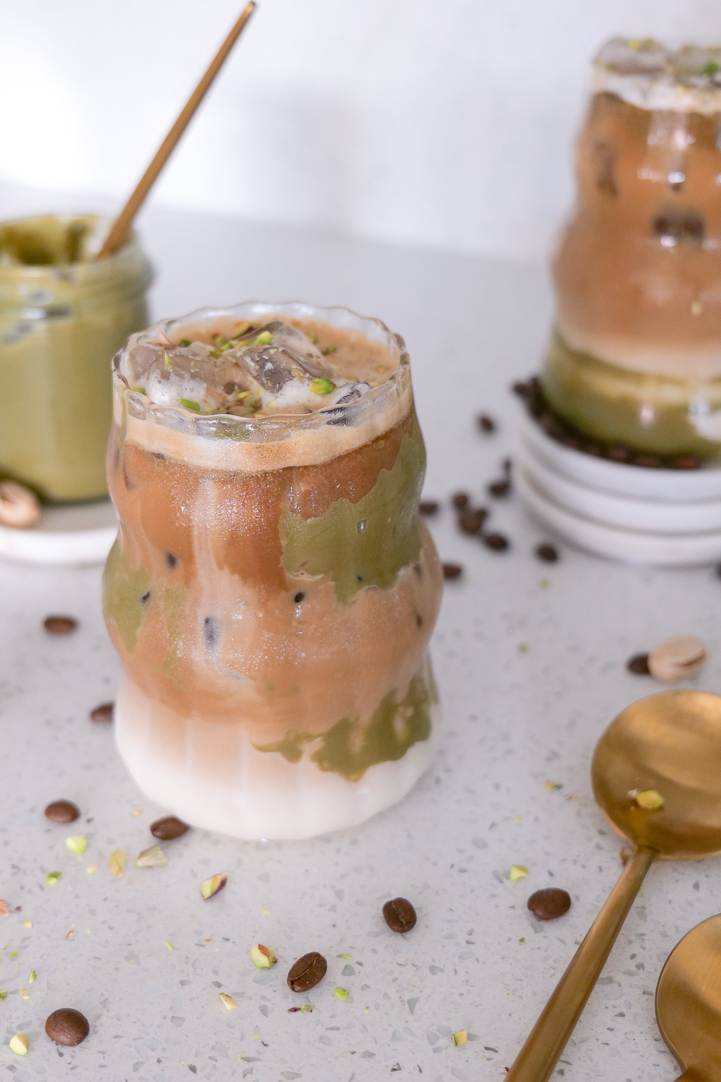 Creamy pistachio latte sweetened with maple syrup and pistachio coffee syrup.