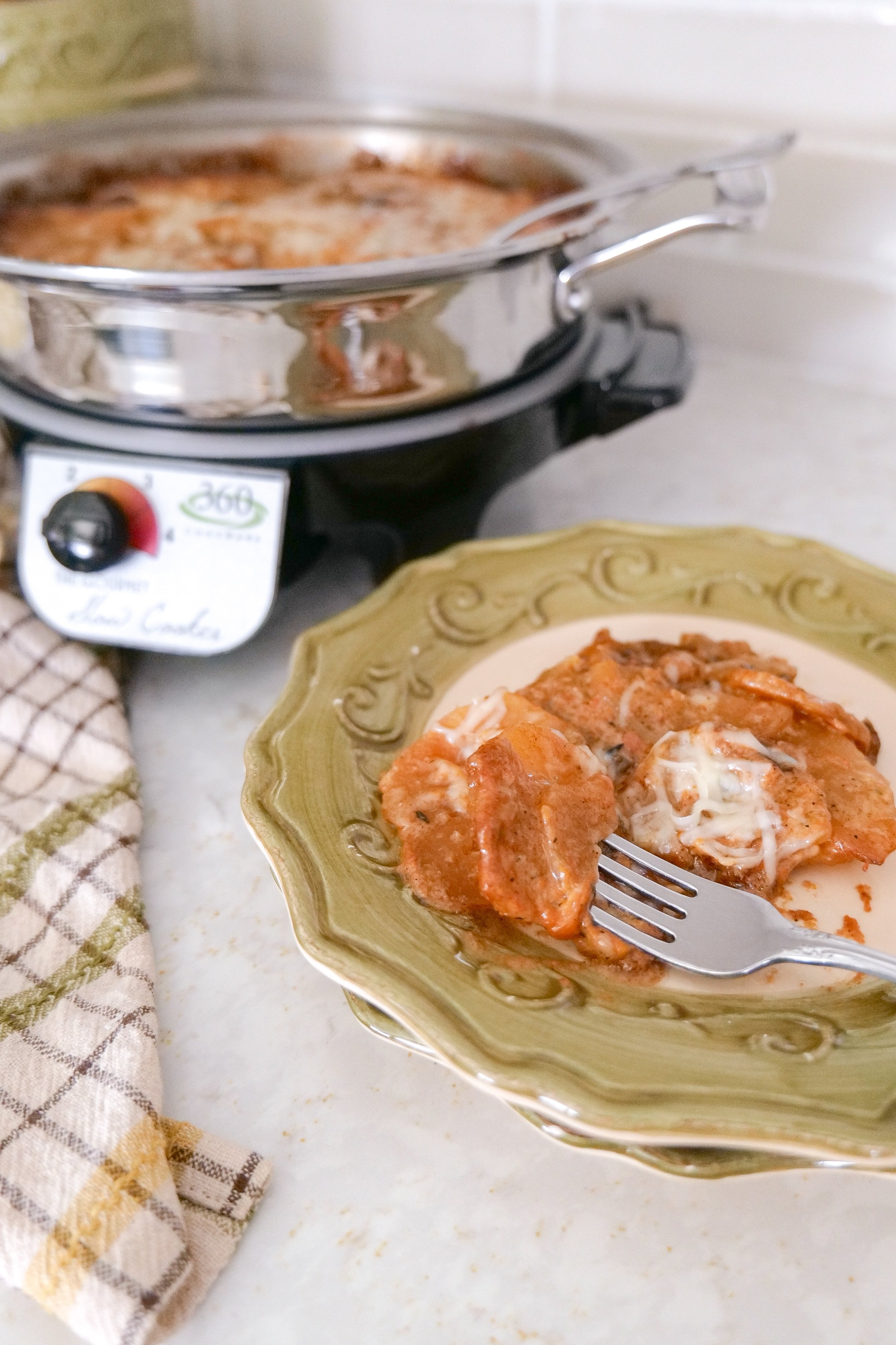 The best creamy scalloped potatoes made in the slow cooker.