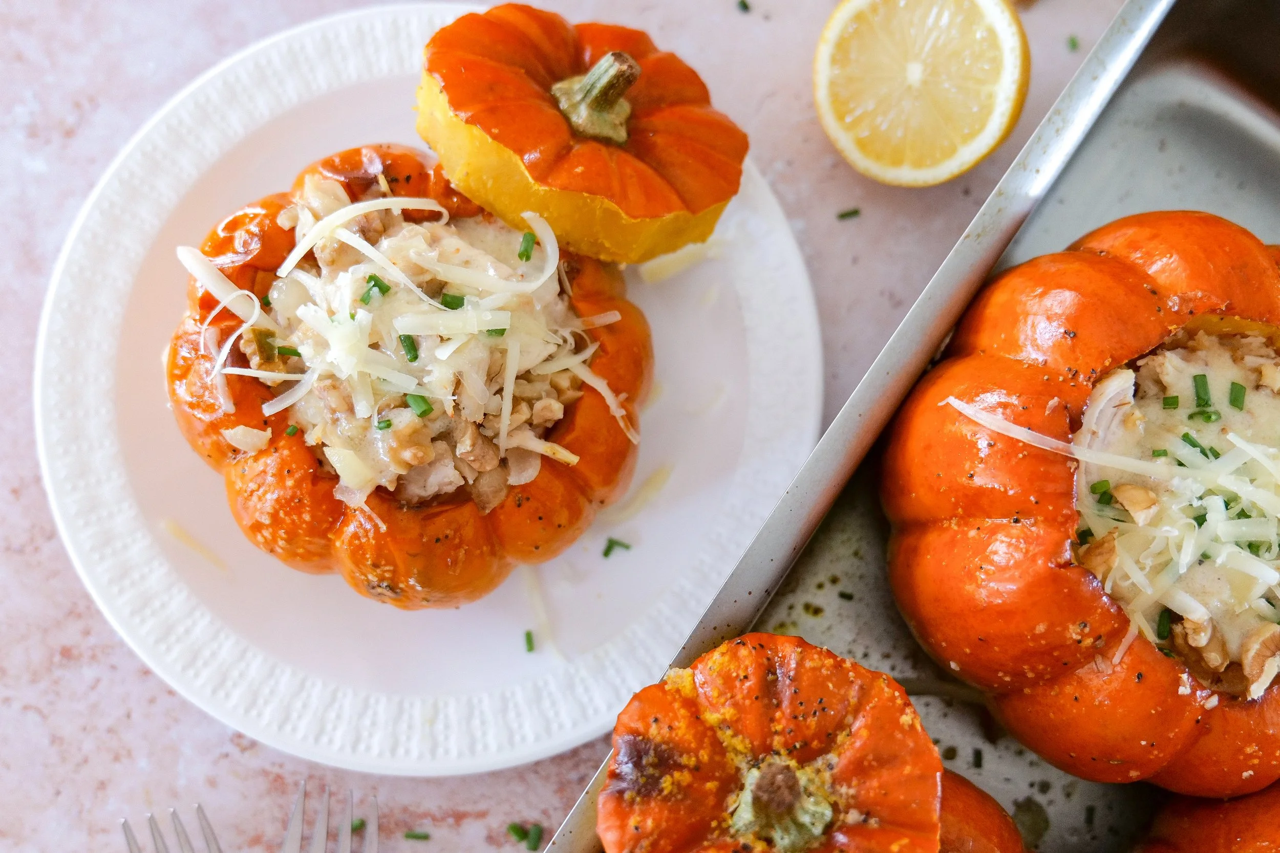 Individual roasted pumpkins filled with chicken, Gruyère cheese and walnuts.
