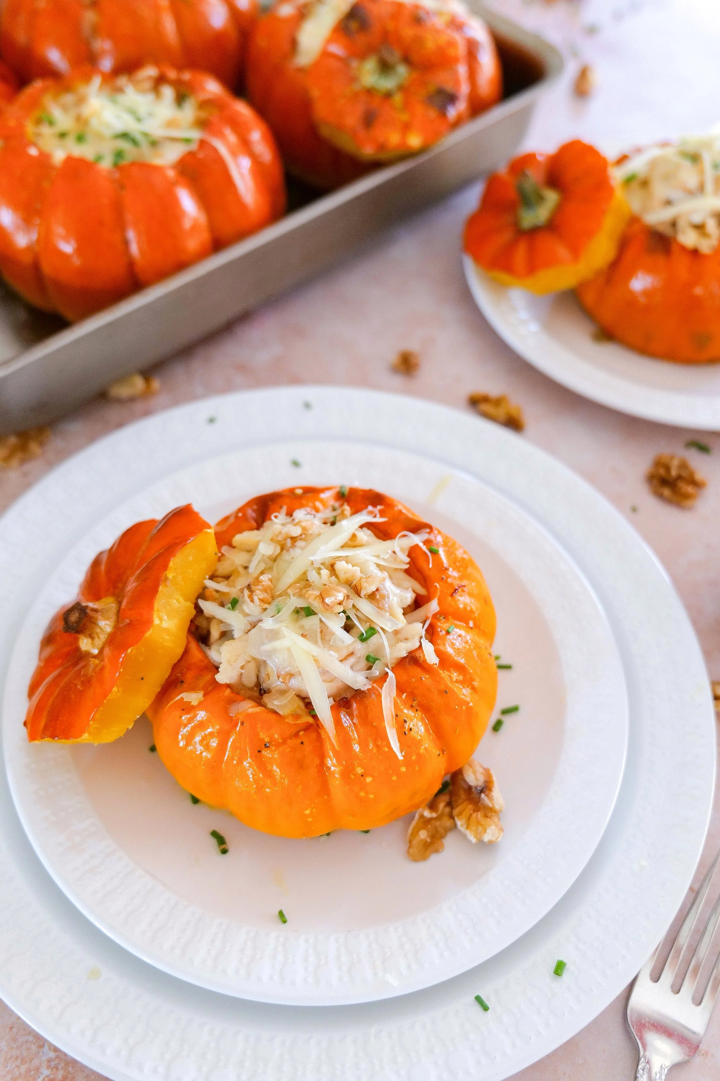 Chicken stuffed pumpkin served as a warm and savory fall dinner.