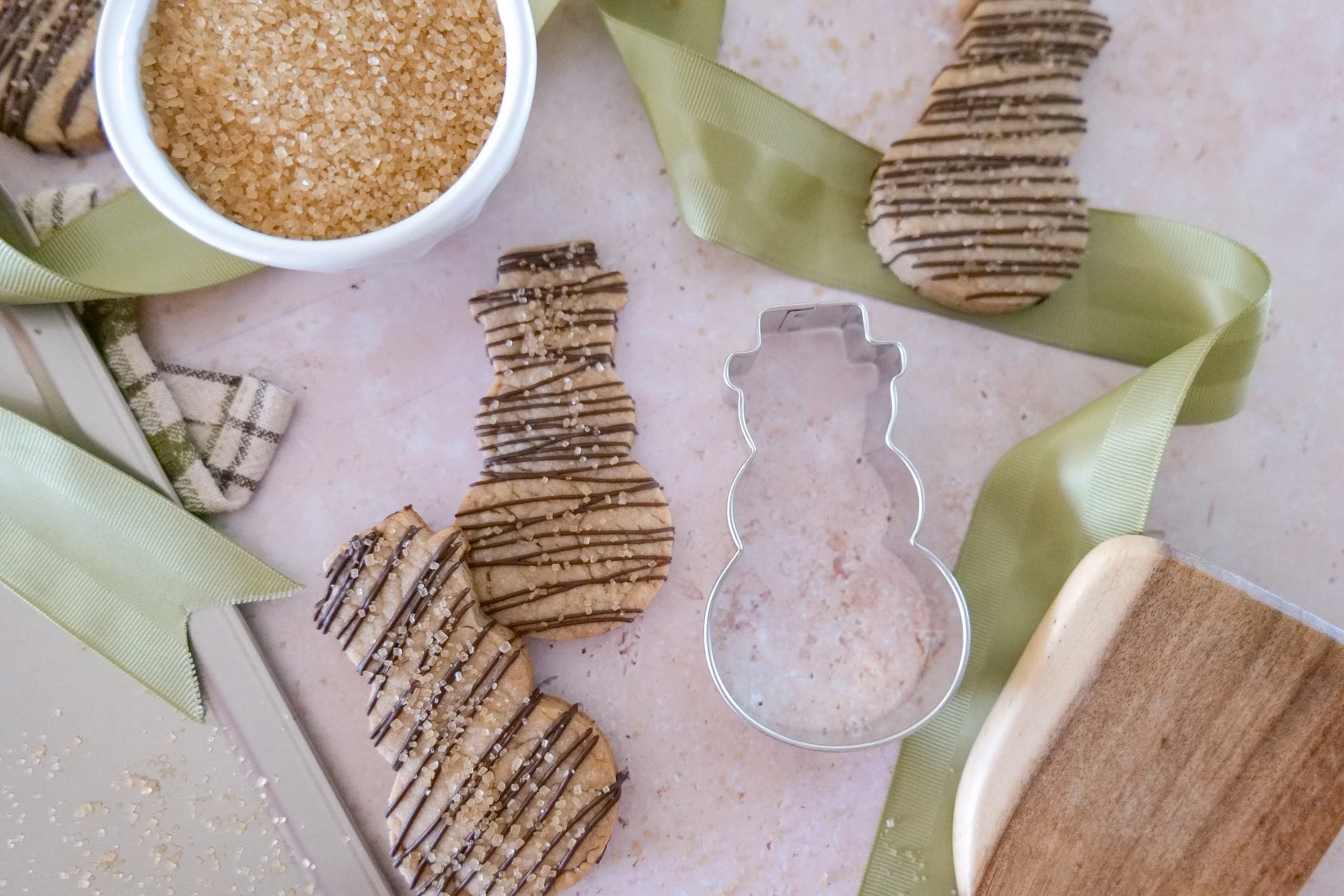 snowman Christmas tree shortbread cookies made with brown butter and decorated with chocolate drizzle for holiday baking.