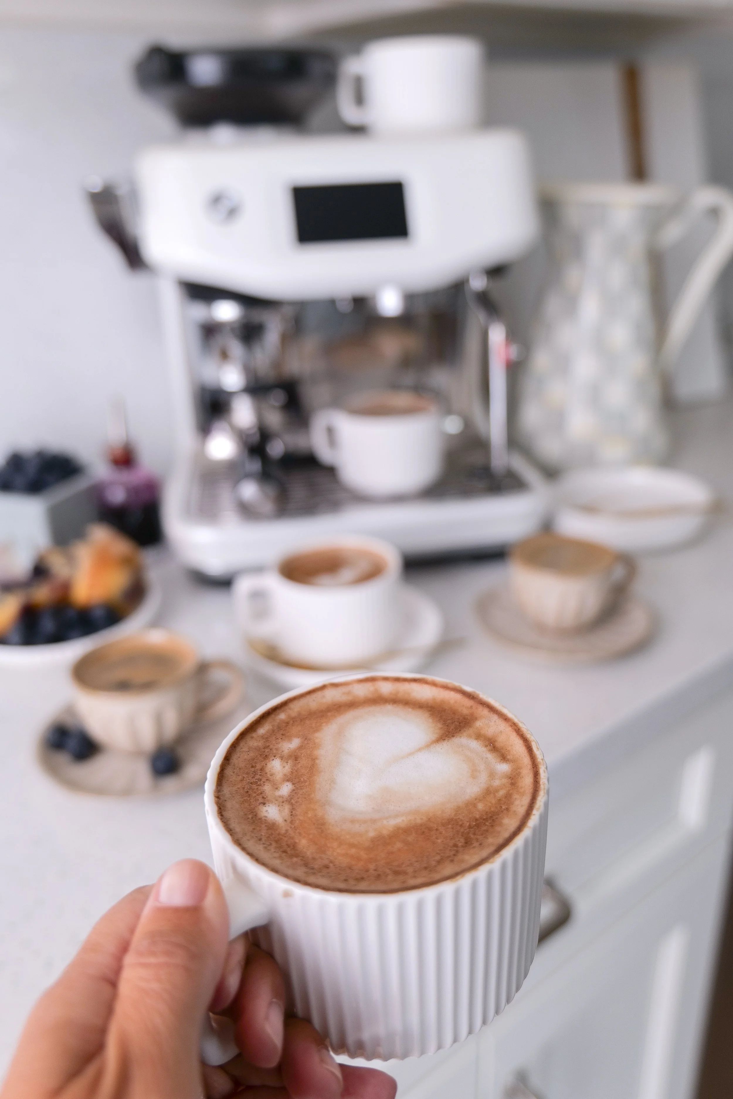 Blueberry Muffin Latte served with fresh blueberry muffins for a cozy homemade breakfast.
