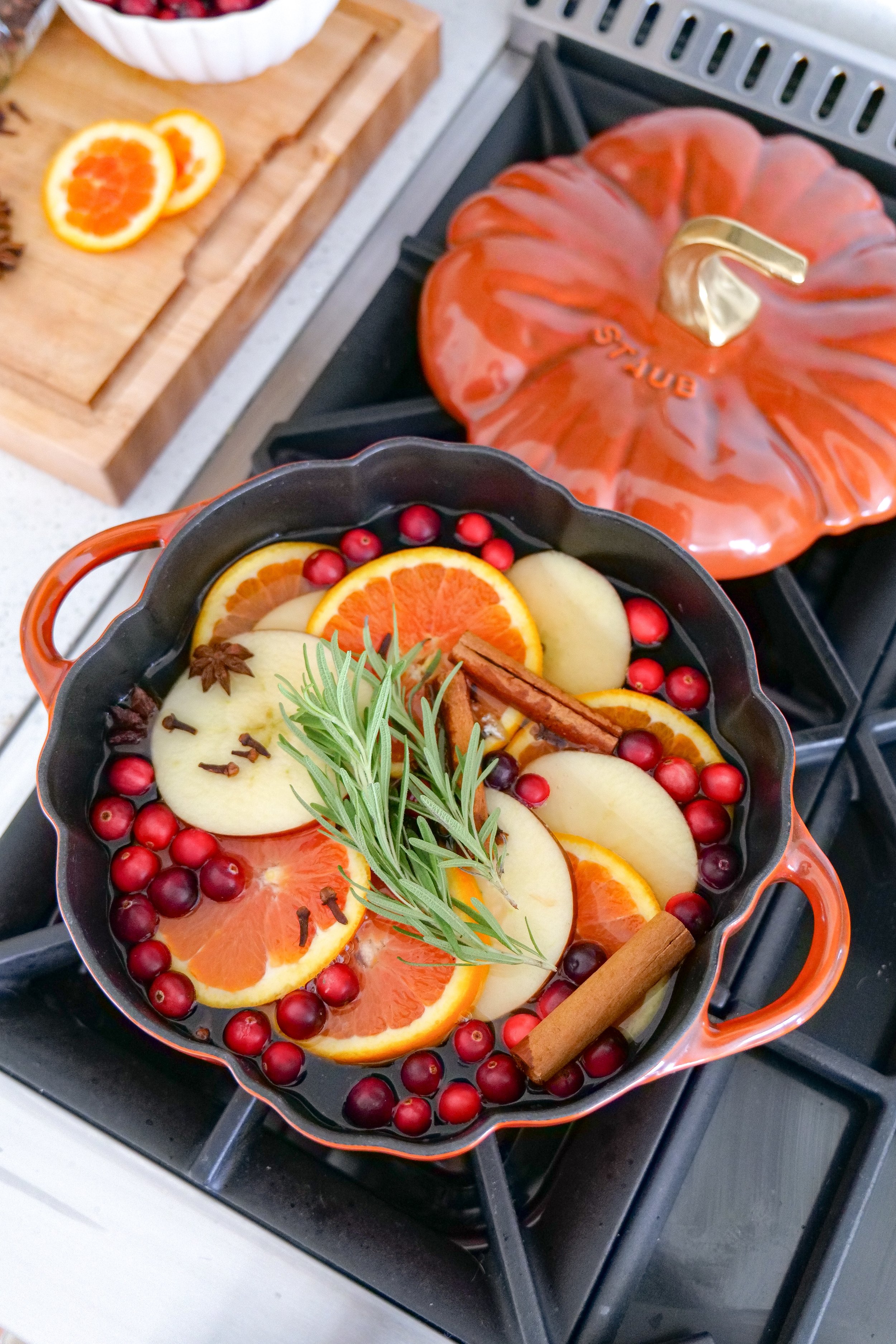 pot.jpg	Pumpkin-shaped simmer pot on the stovetop in a cozy autumn kitchen