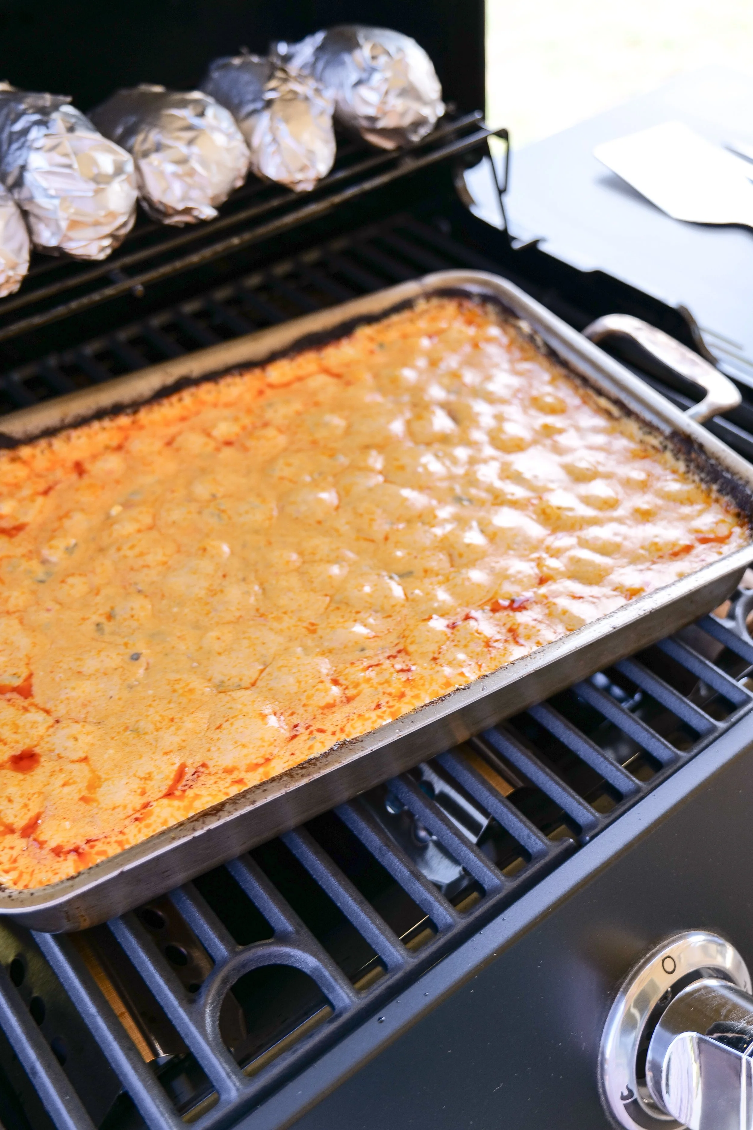 Chorizo queso melting together on the grill