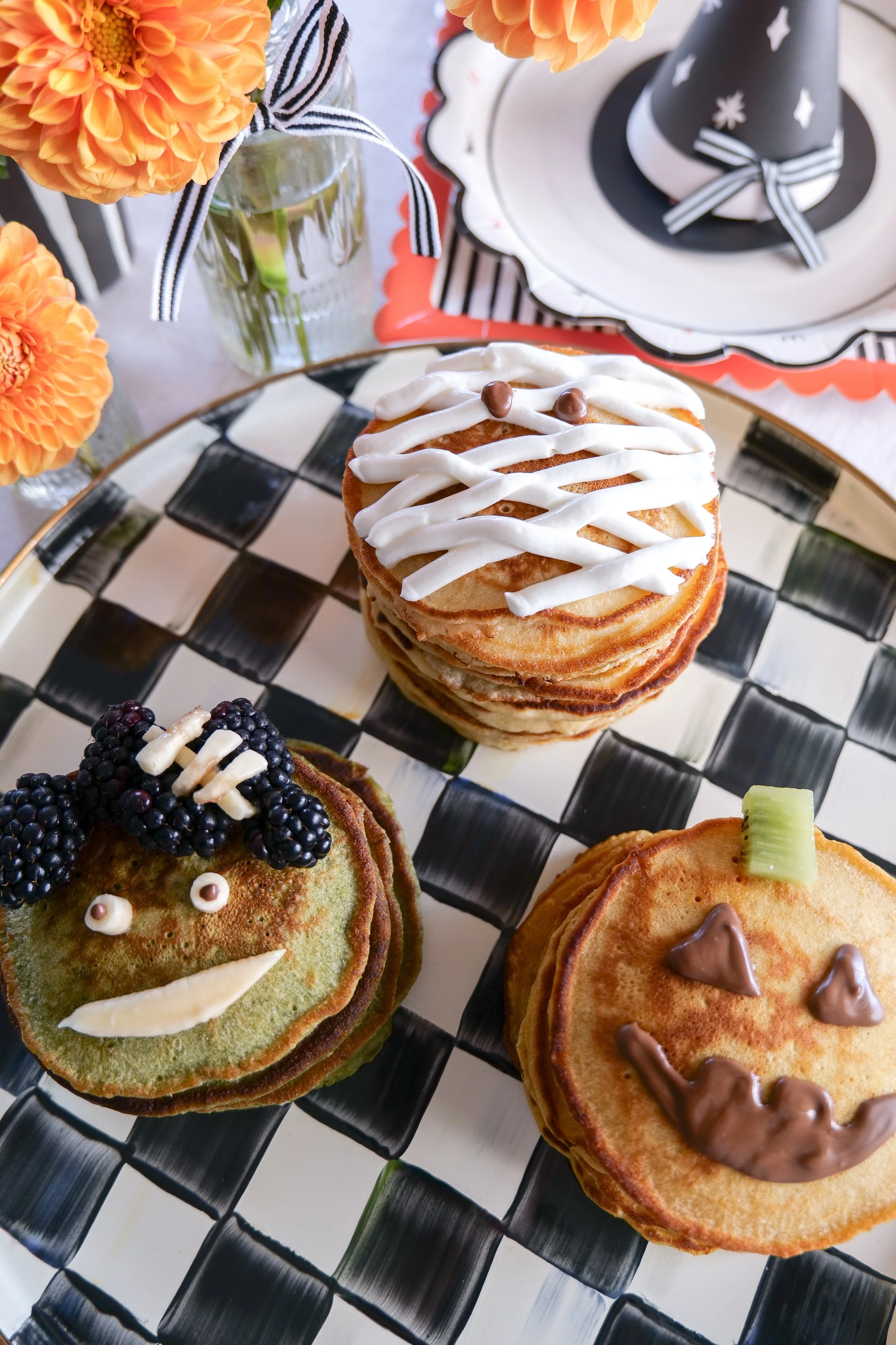 Cute Halloween pancake ideas featuring mummy, pumpkin and Frankenstein sourdough pancakes.