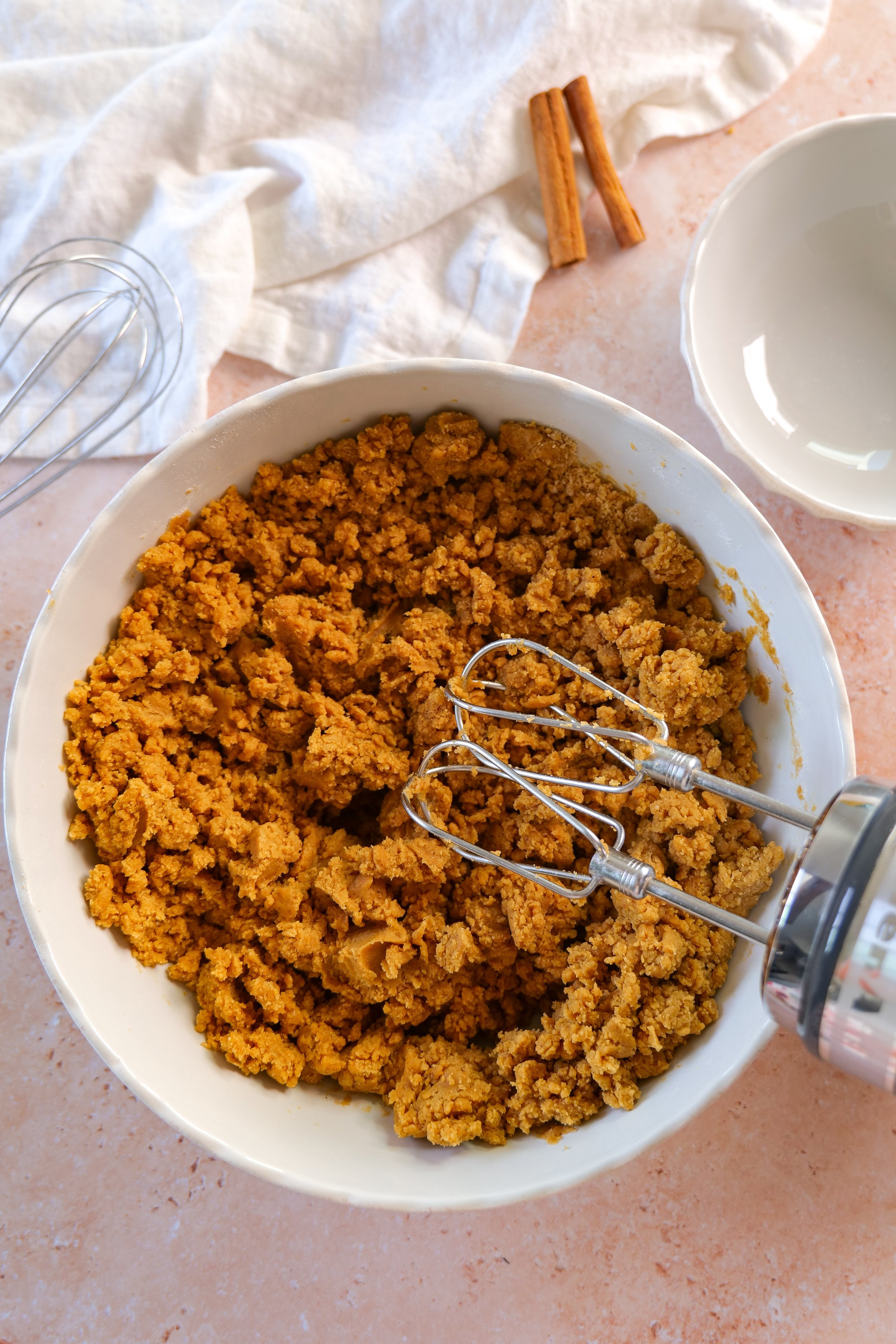 Brown butter pumpkin sugar cookie dough being mixed
