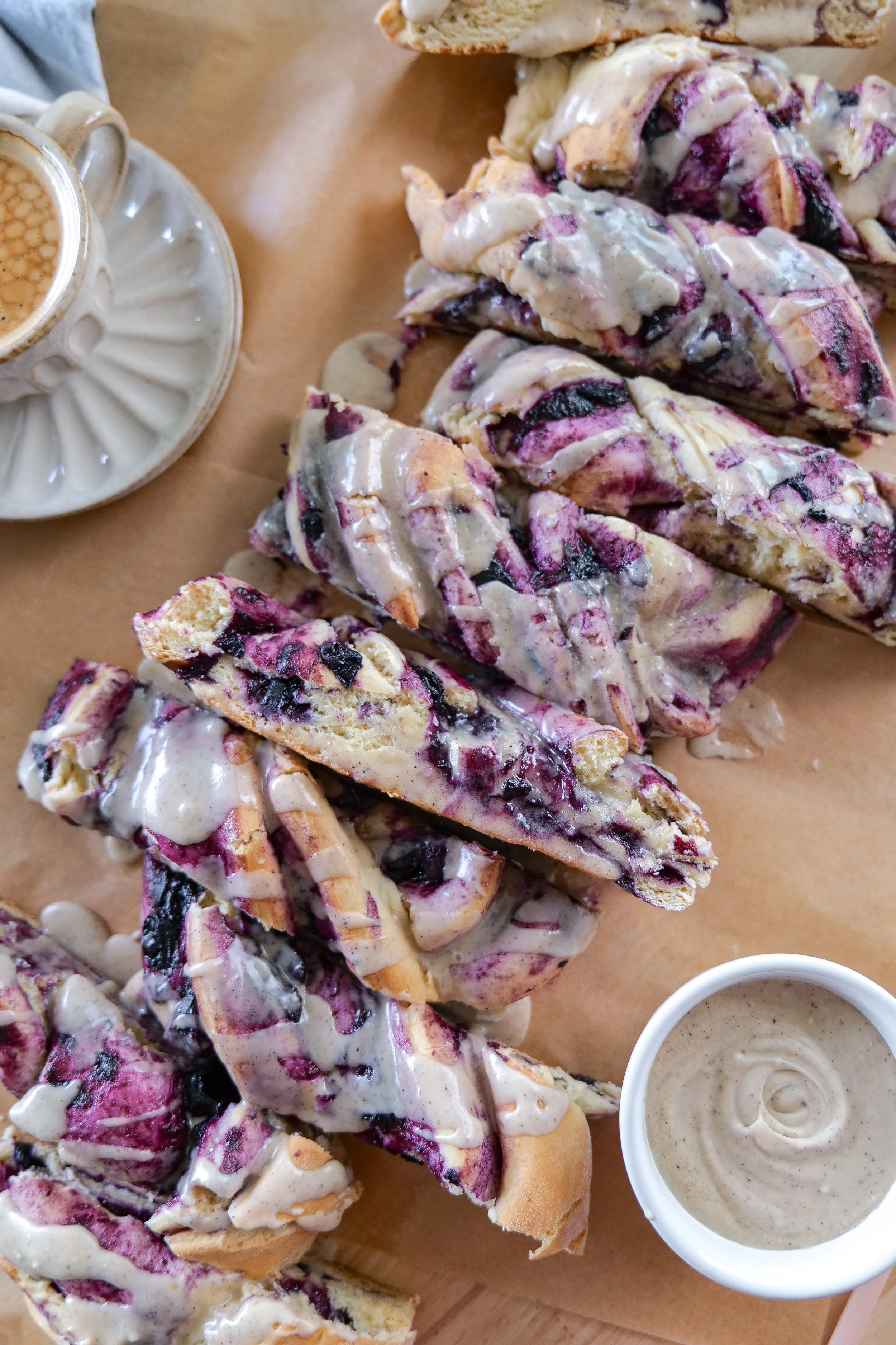 Blueberry breakfast loaf with cinnamon filling and homemade brown butter icing.