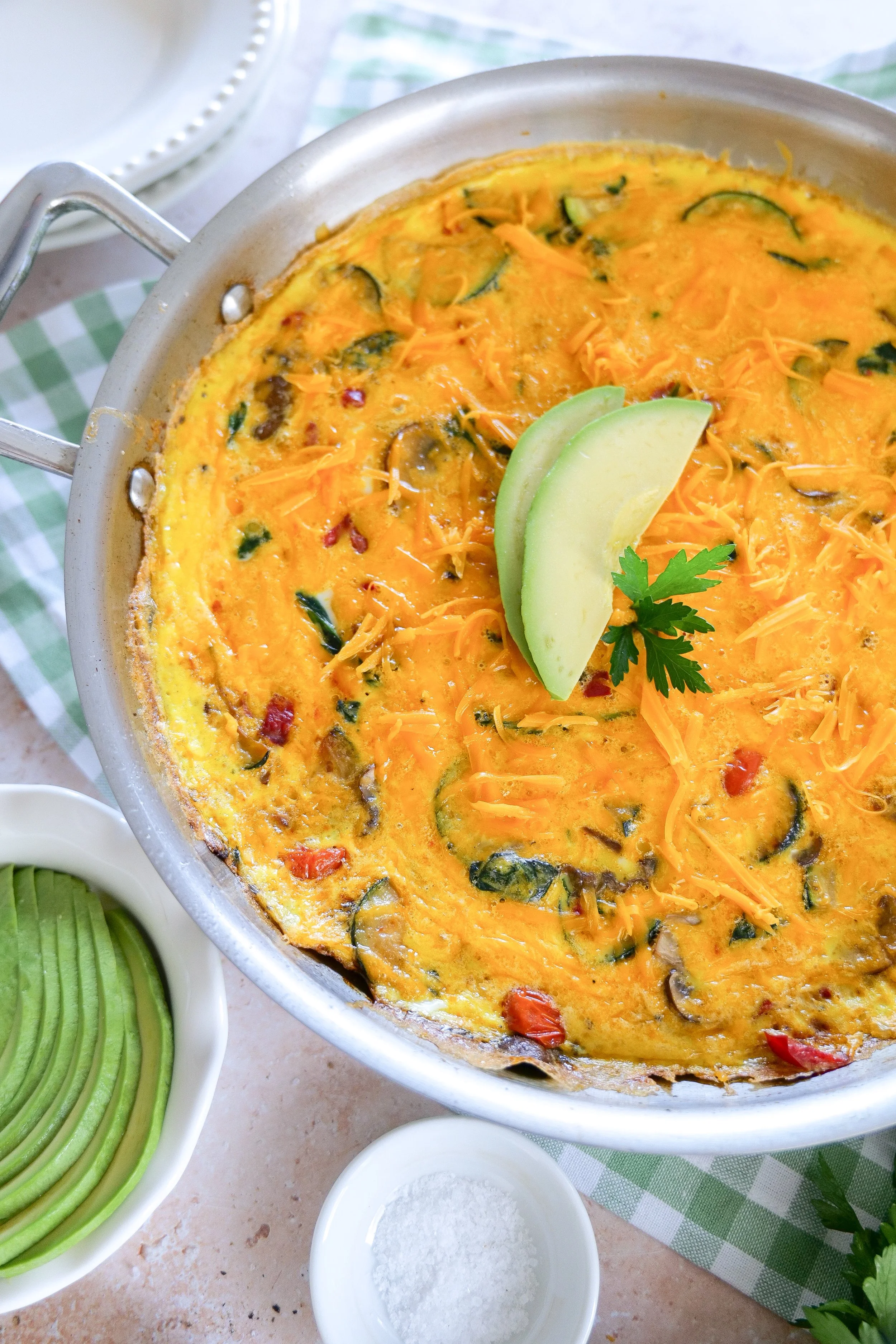 Healthy gluten-free vegetable frittata baked with fresh summer vegetables