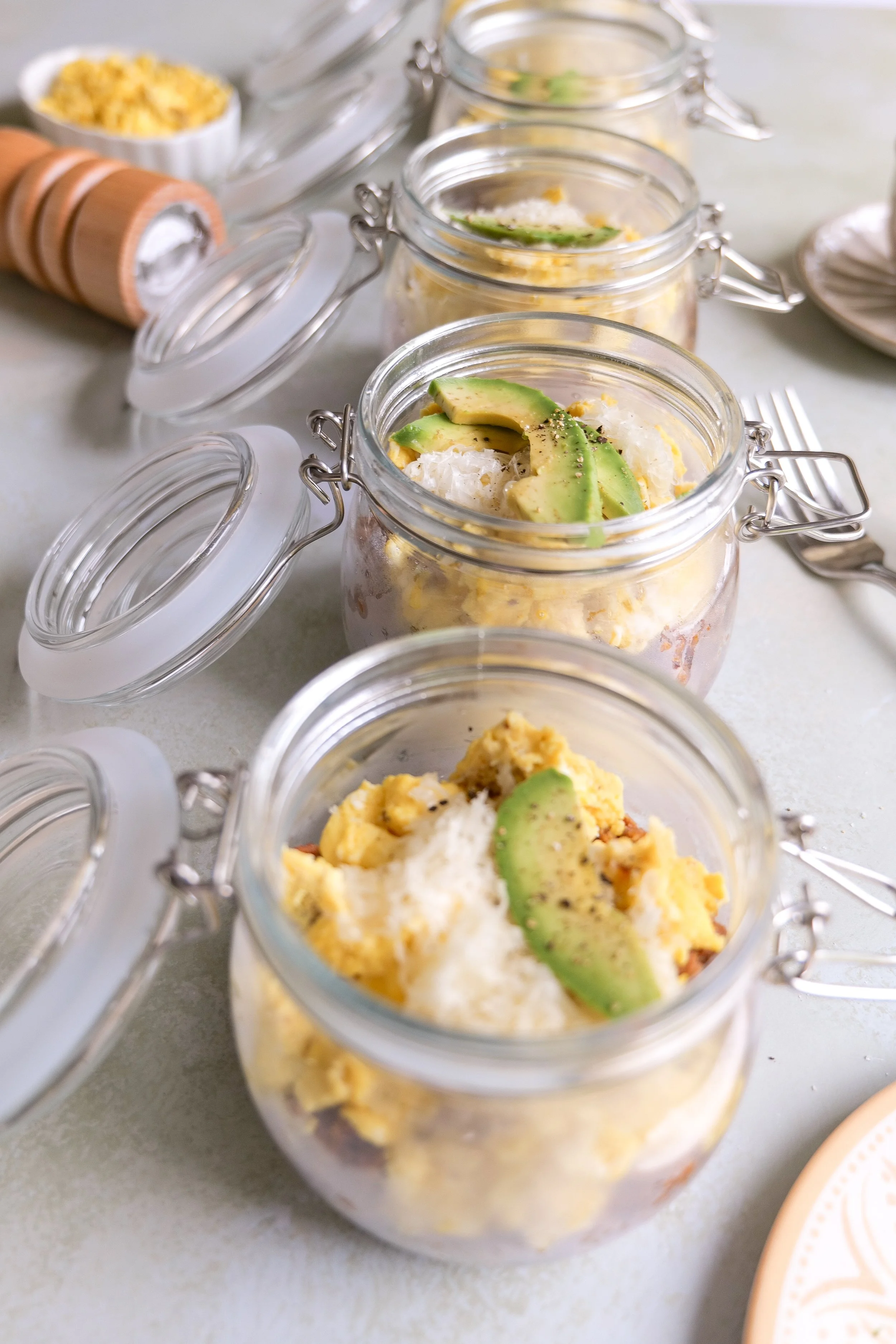 Easy chorizo breakfast bowl recipe with scrambled eggs, crispy potatoes, cheese and avocado.