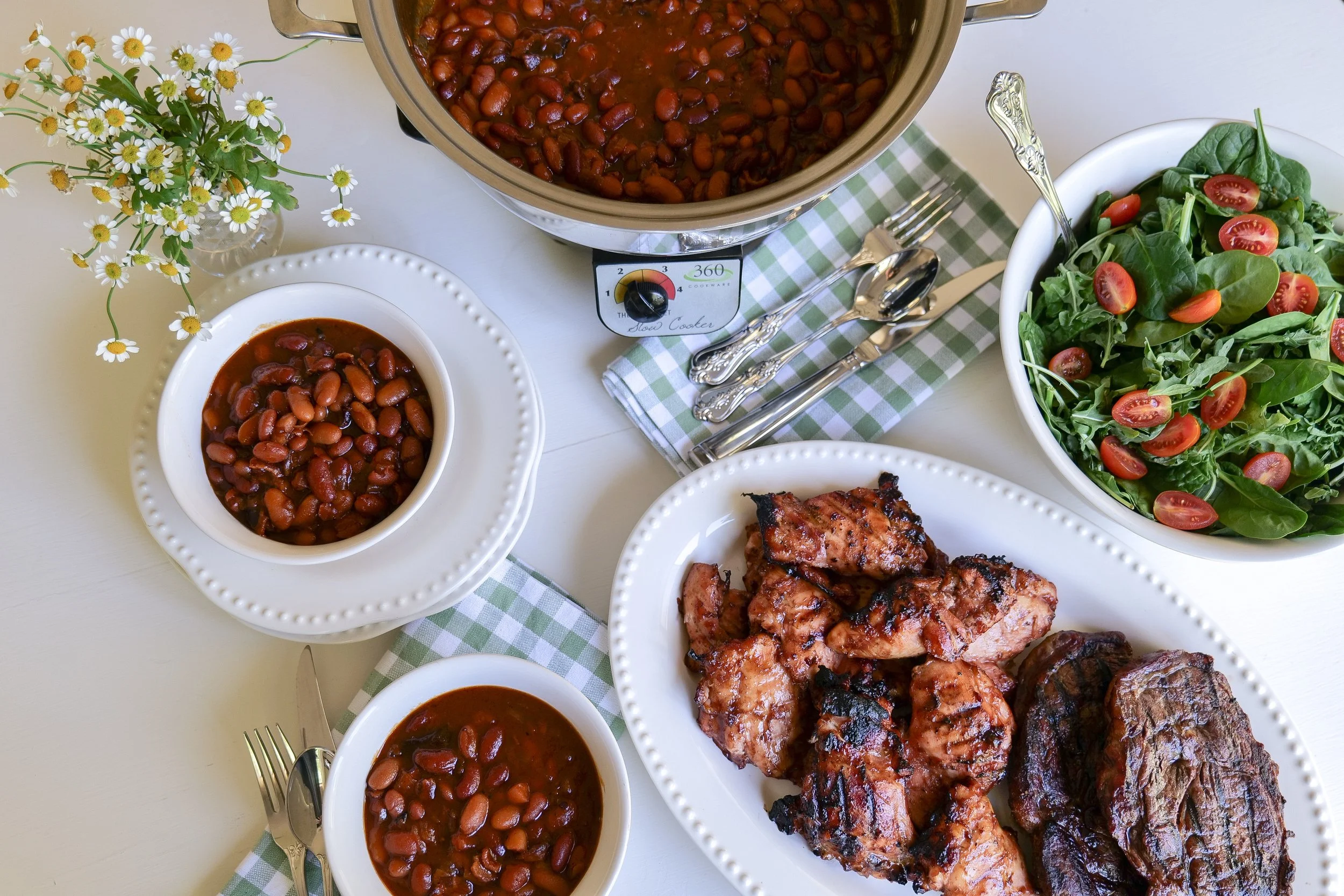 Homemade crockpot beans served as an easy side dish for family gatherings