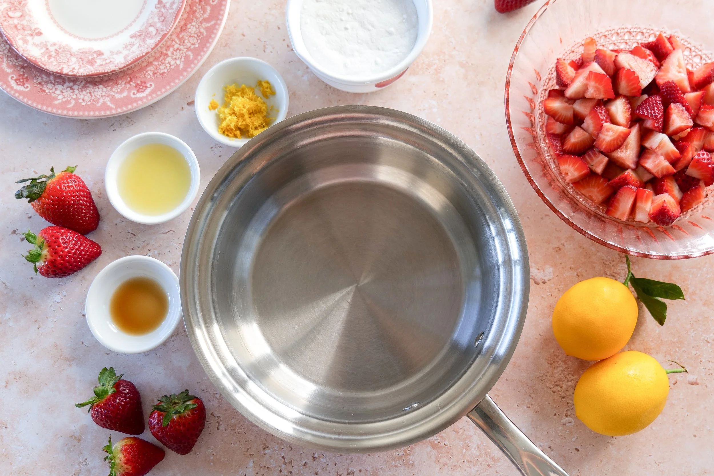 diced fresh strawberries, granulated sugar, lemon juice, lemon zest, and vanilla extract