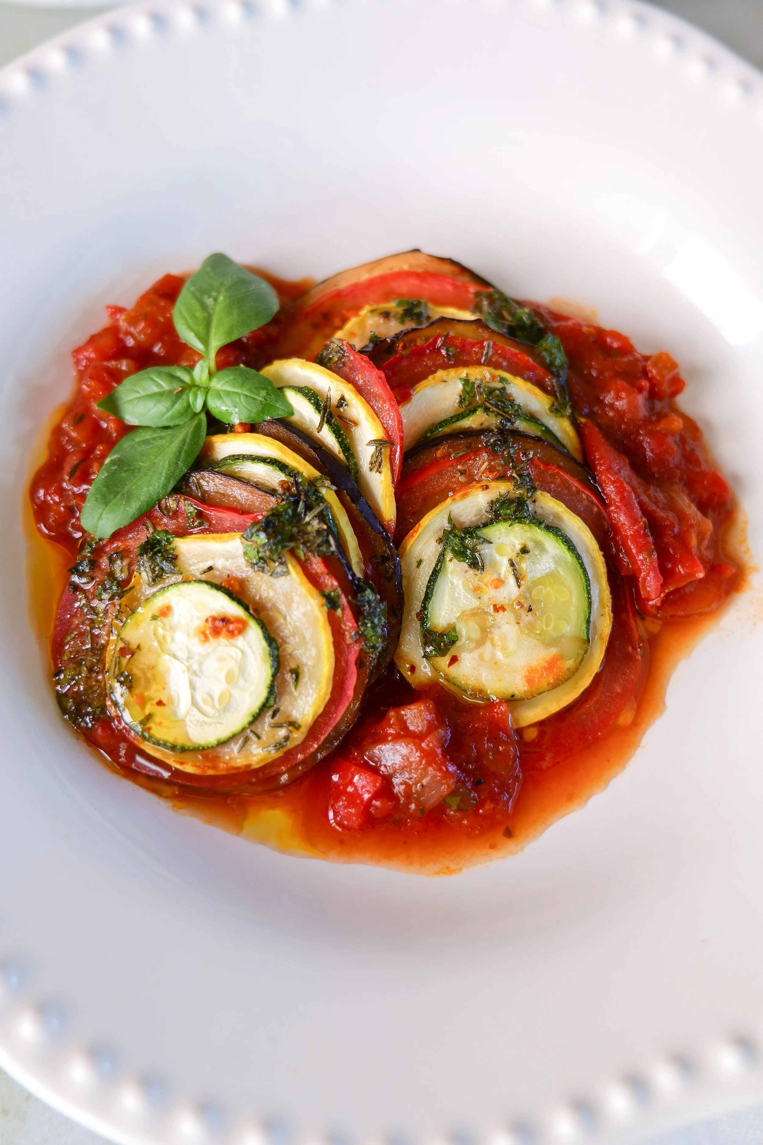Flavorful vegetable ratatouille served as a simple summer meal.
