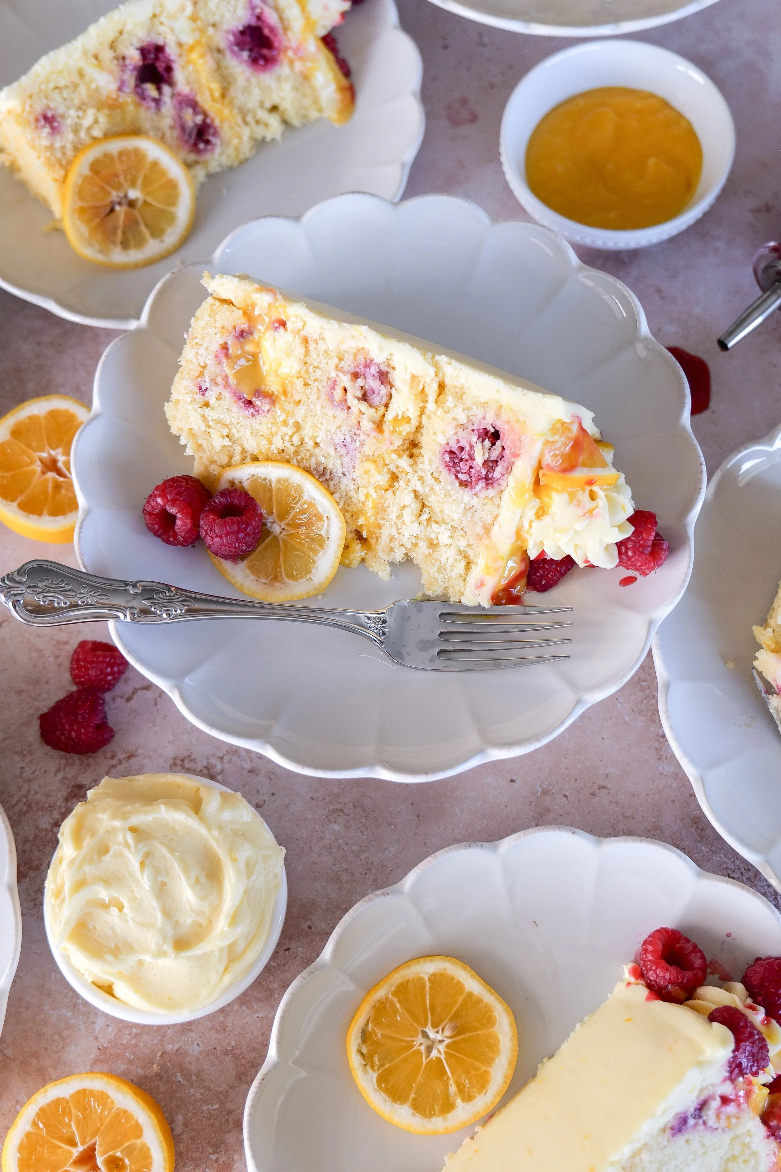 Spring lemon raspberry cake perfect for celebrations and gatherings.