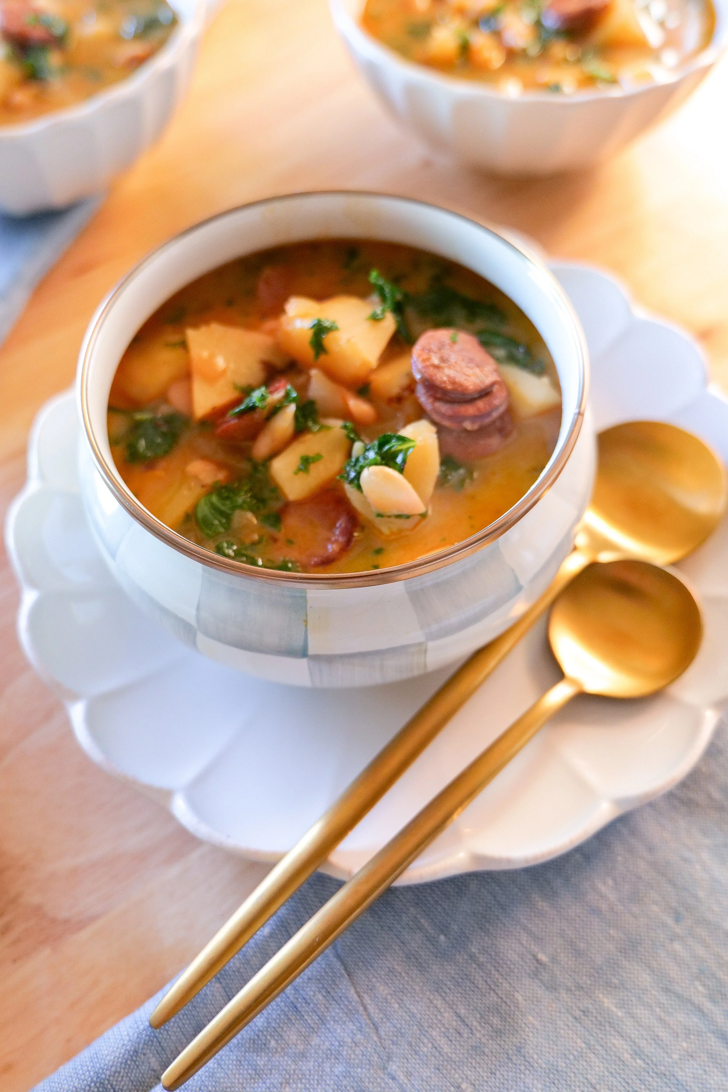 Hearty Portuguese kale soup with chunks of potato, linguiça and tender kale.