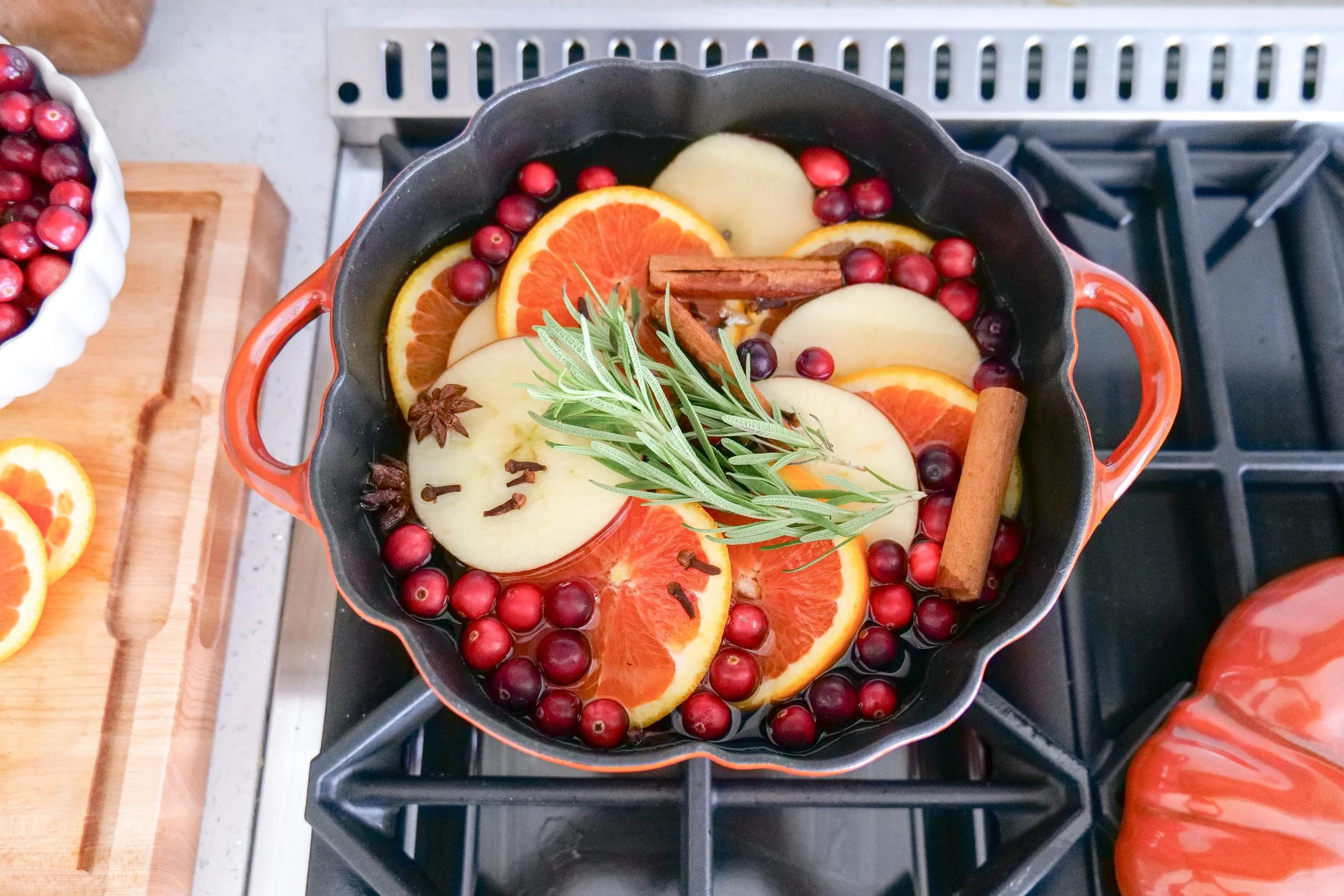 Autumn stovetop potpourri gently simmering with fruit and warm spices