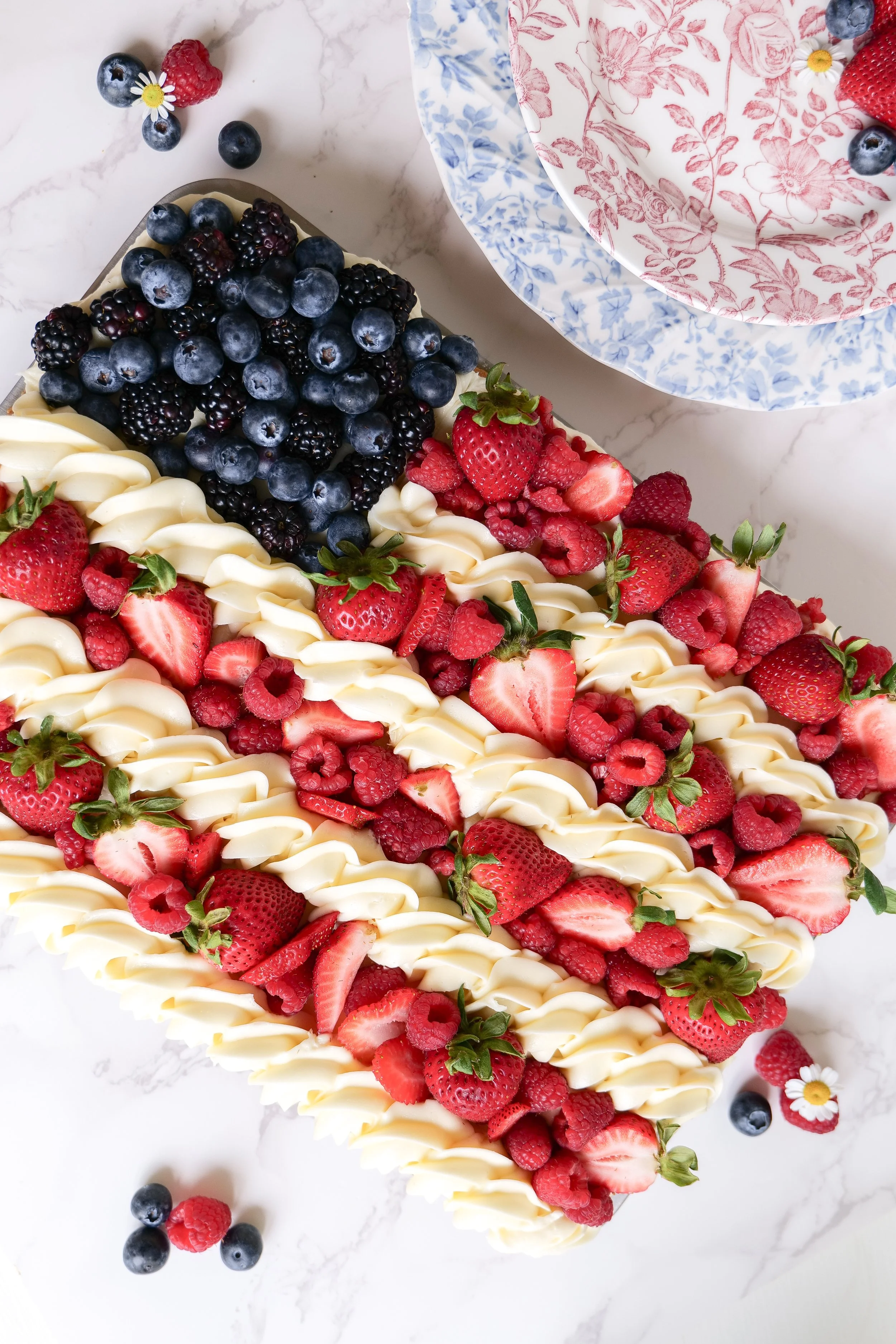 Fresh berry fruit pizza styled for a patriotic Fourth of July party