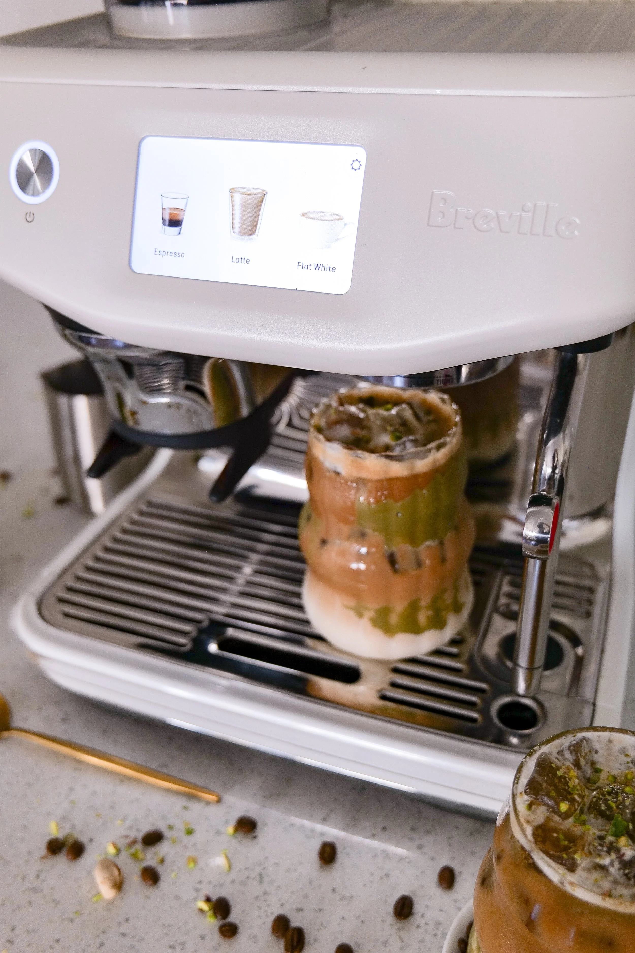 Pistachio latte made at home with espresso, milk, and pistachio flavor.