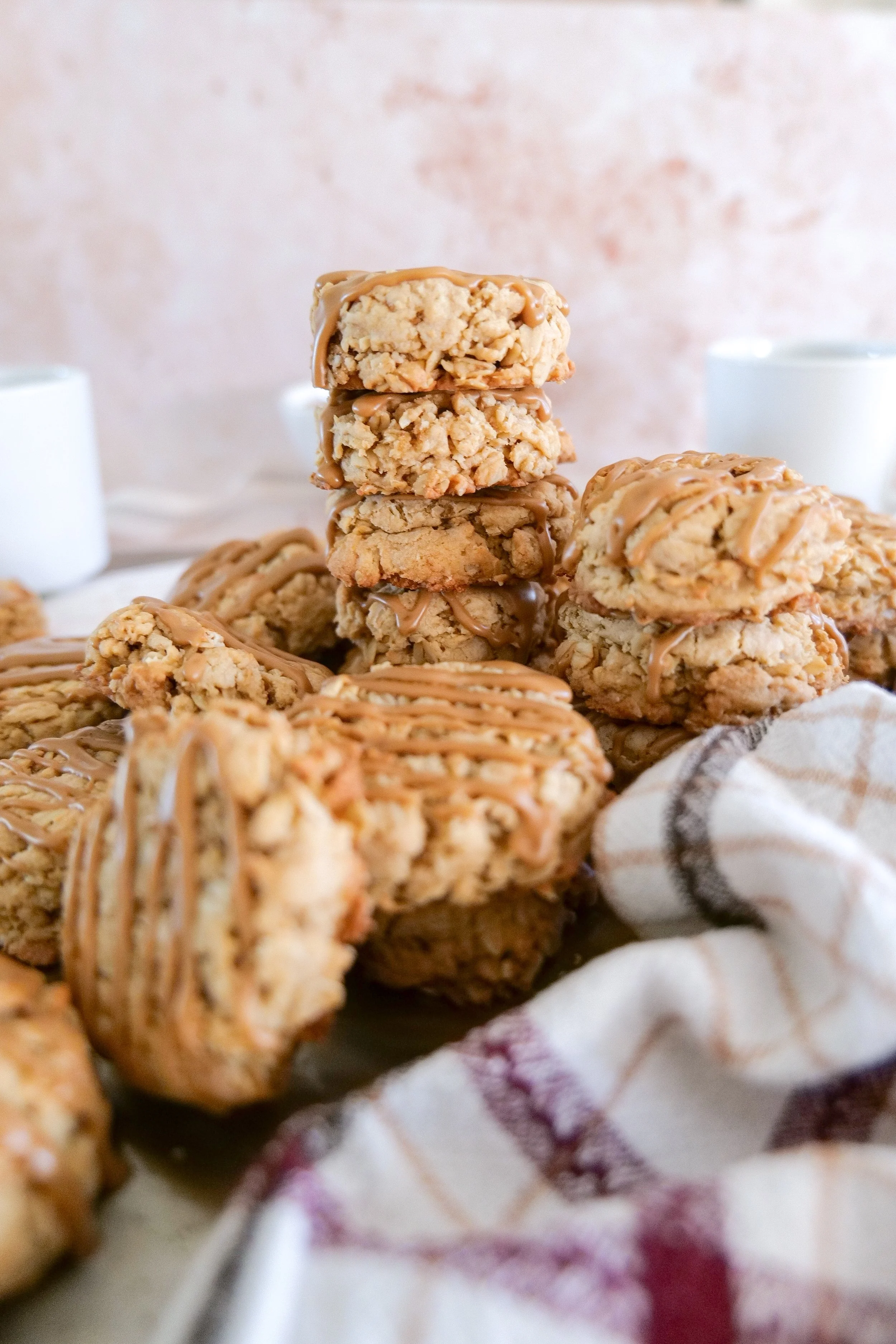 Brown butter espresso oatmeal cookies with golden edges and a soft center.