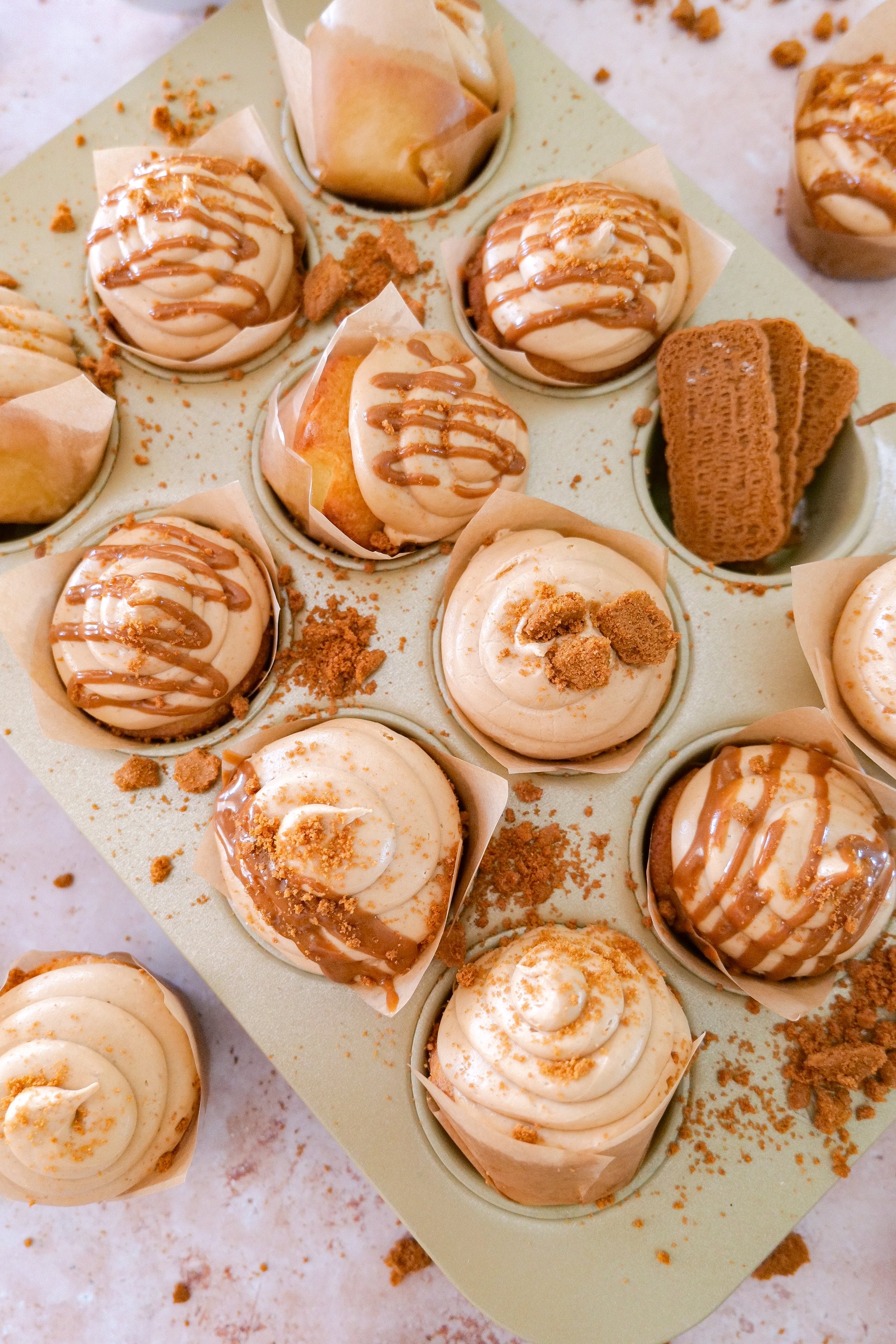Cookie butter cupcakes filled with homemade cookie butter and topped with creamy cookie butter frosting