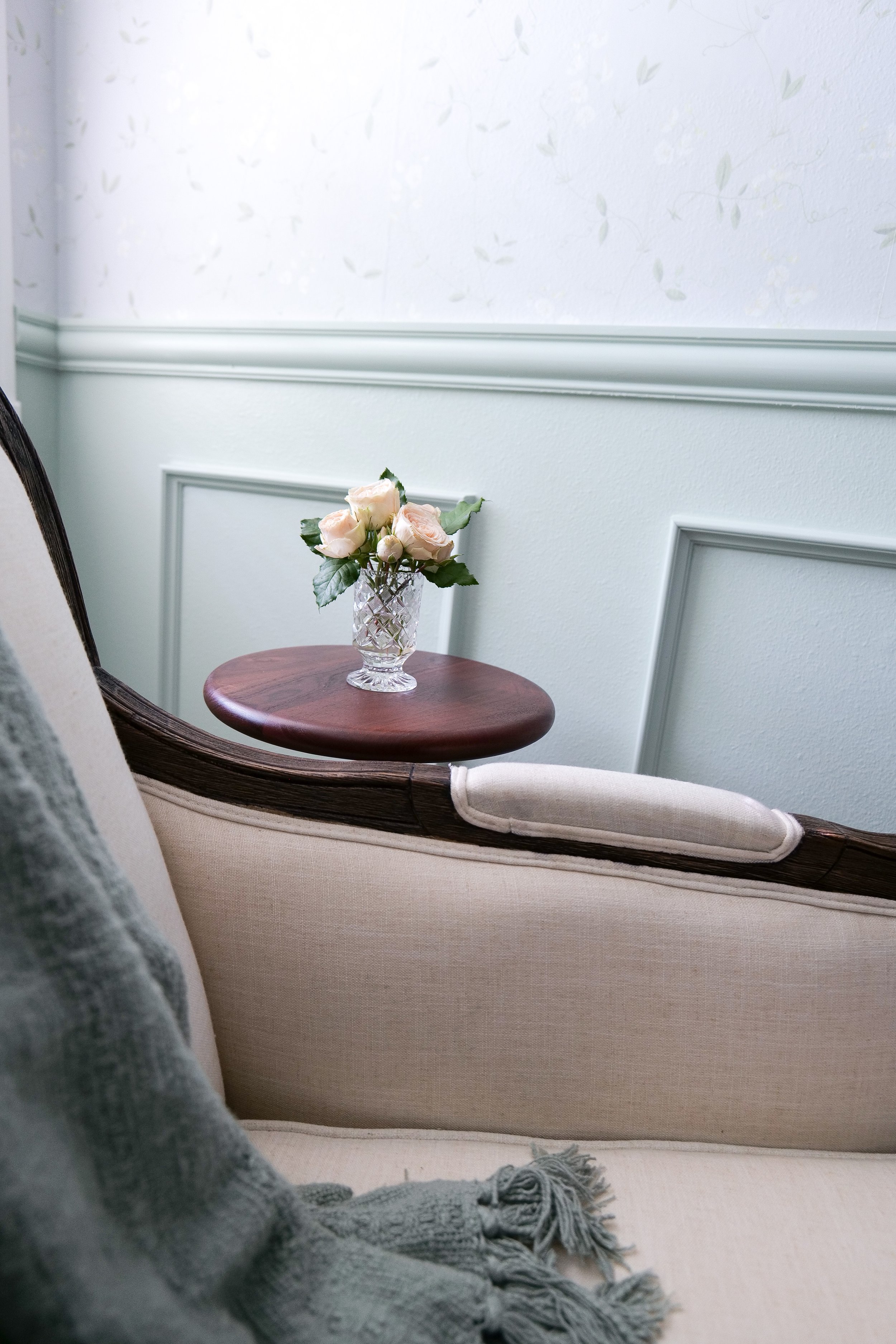 Traditional guest bedroom nightstands styled with lamps and simple elegant decor.