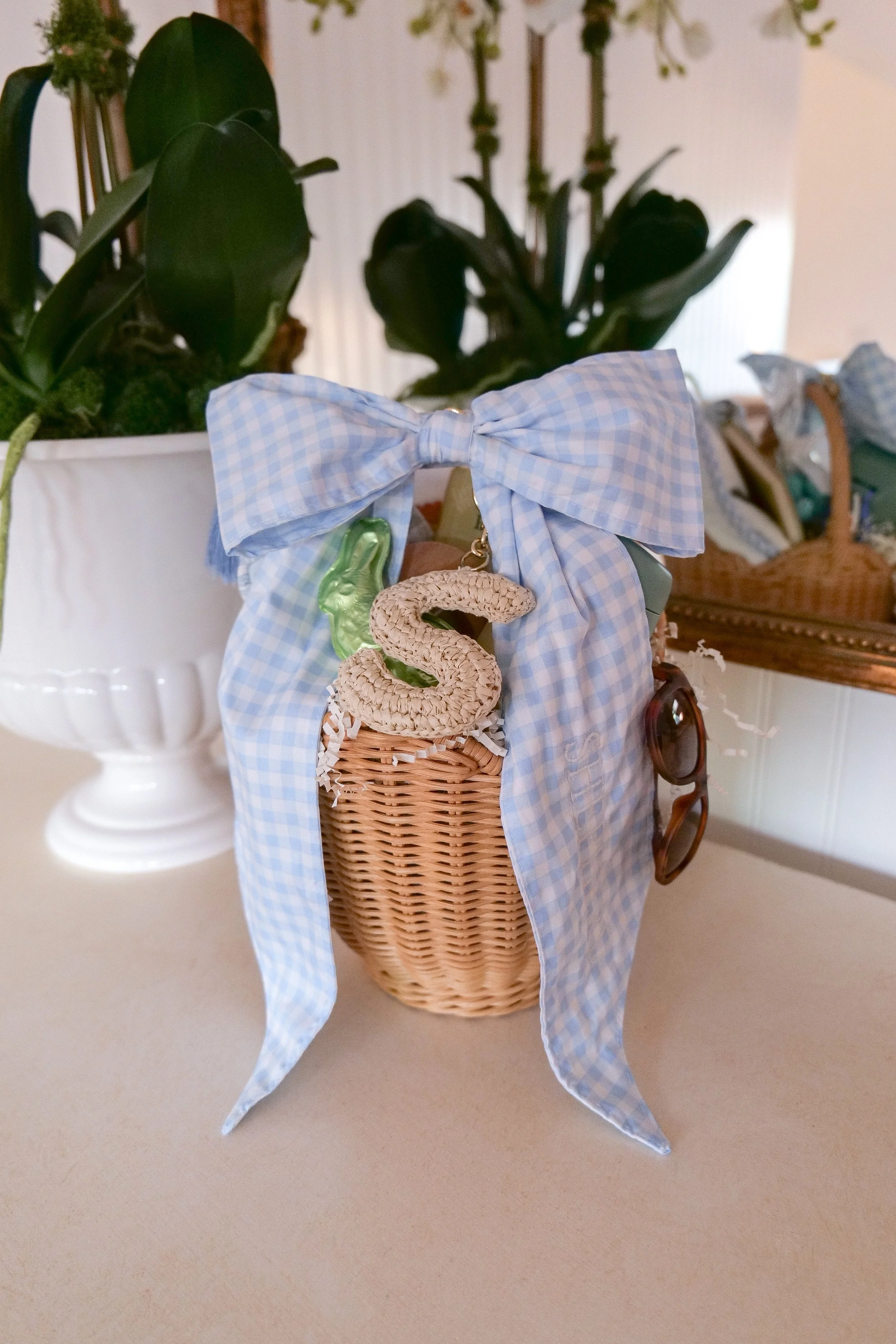 Art supplies and creative gifts arranged as fun non-candy Easter basket ideas for kids.