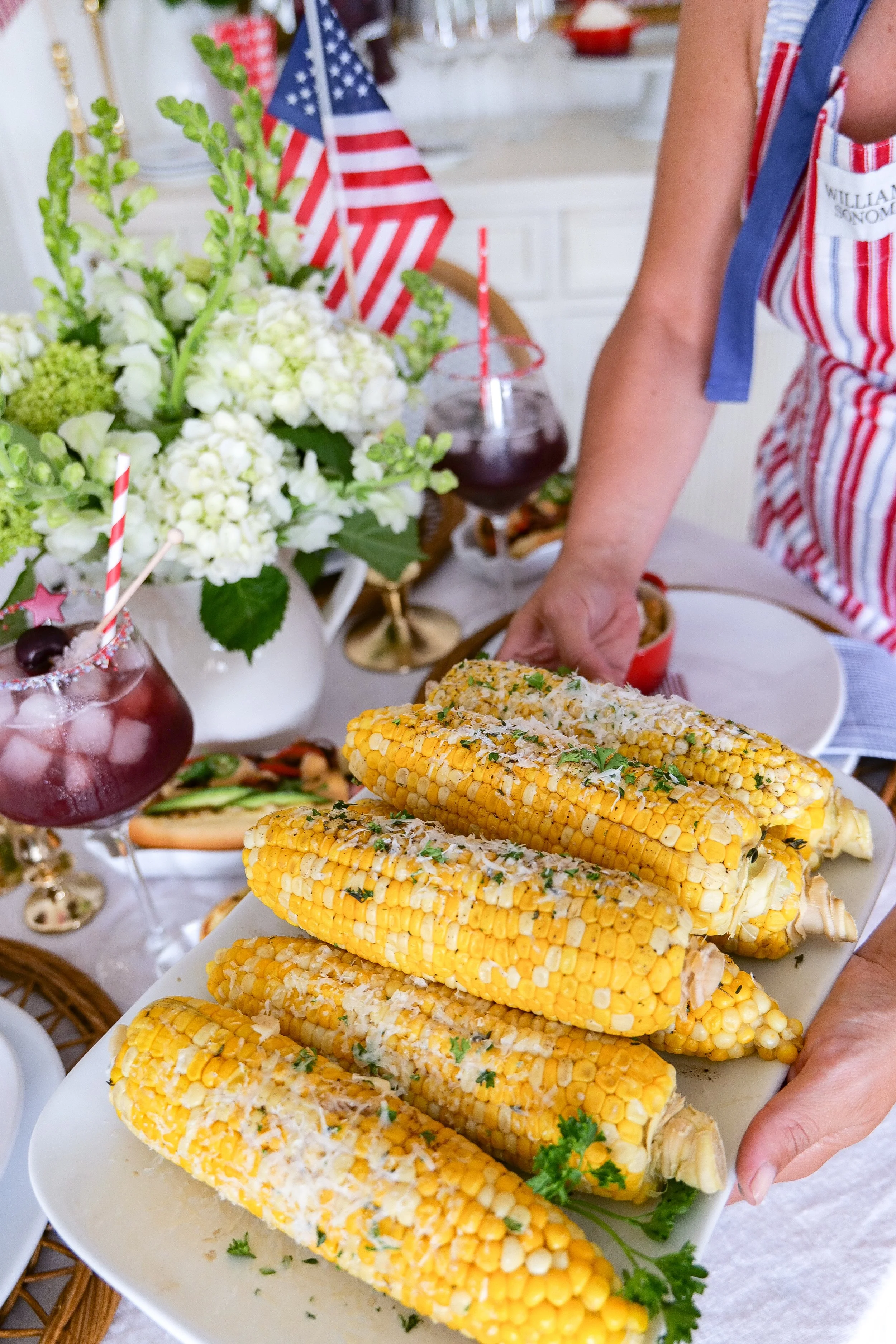 Lifestyle photo featuring homemade corn on the cob for family entertaining