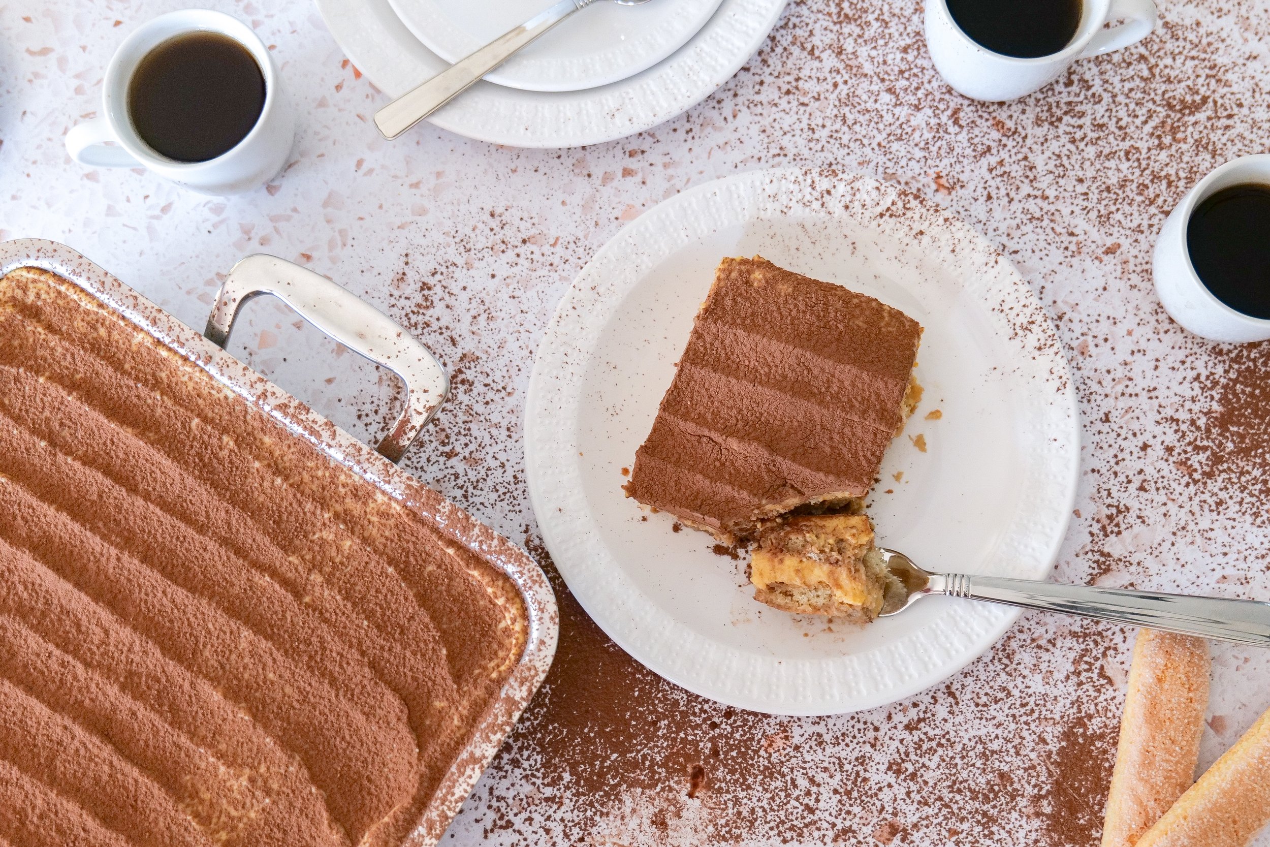 Homemade pumpkin tiramisu finished with a dusting of cocoa and pumpkin spice.