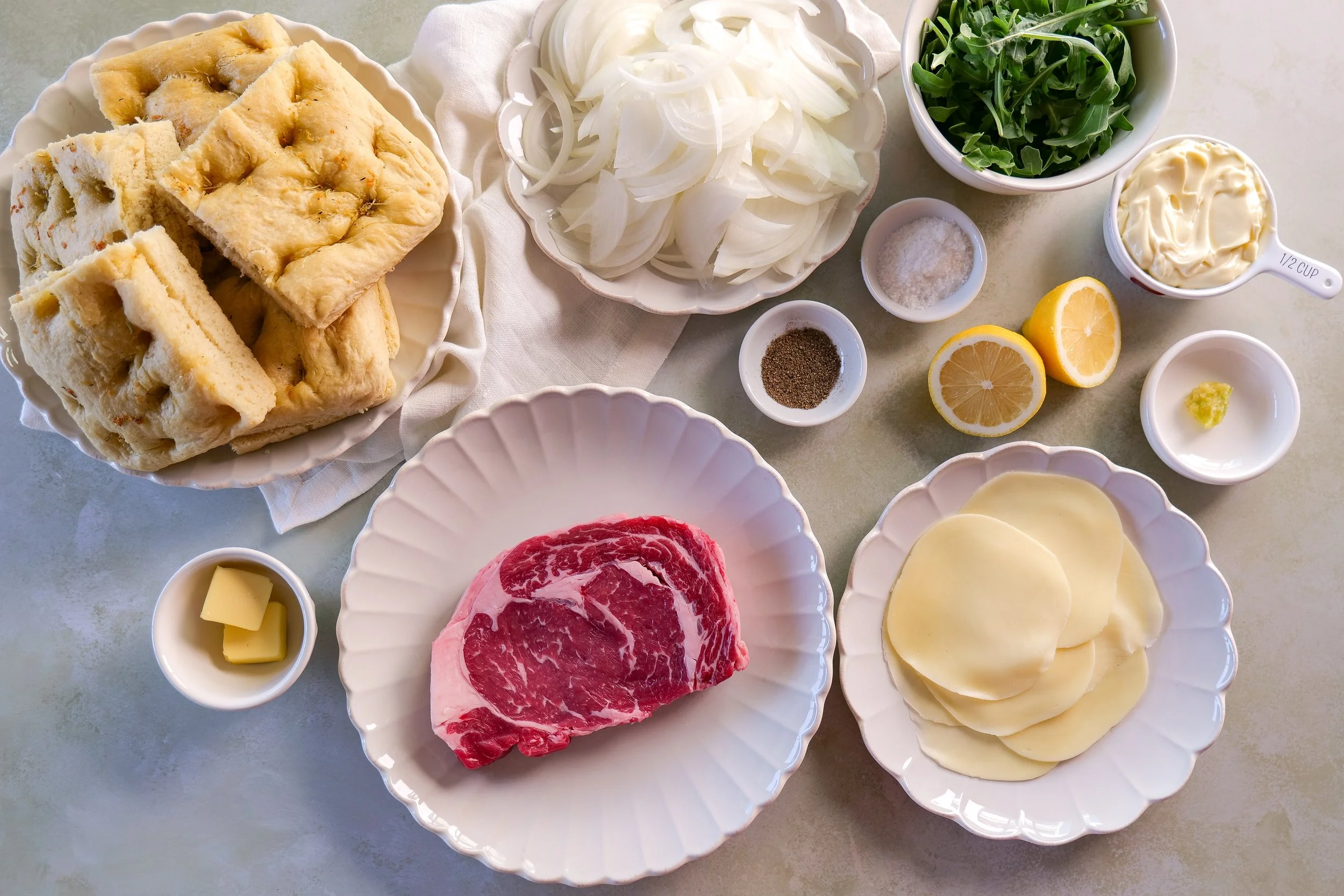 Ingredients for steak focaccia sandwiches with garlic aioli