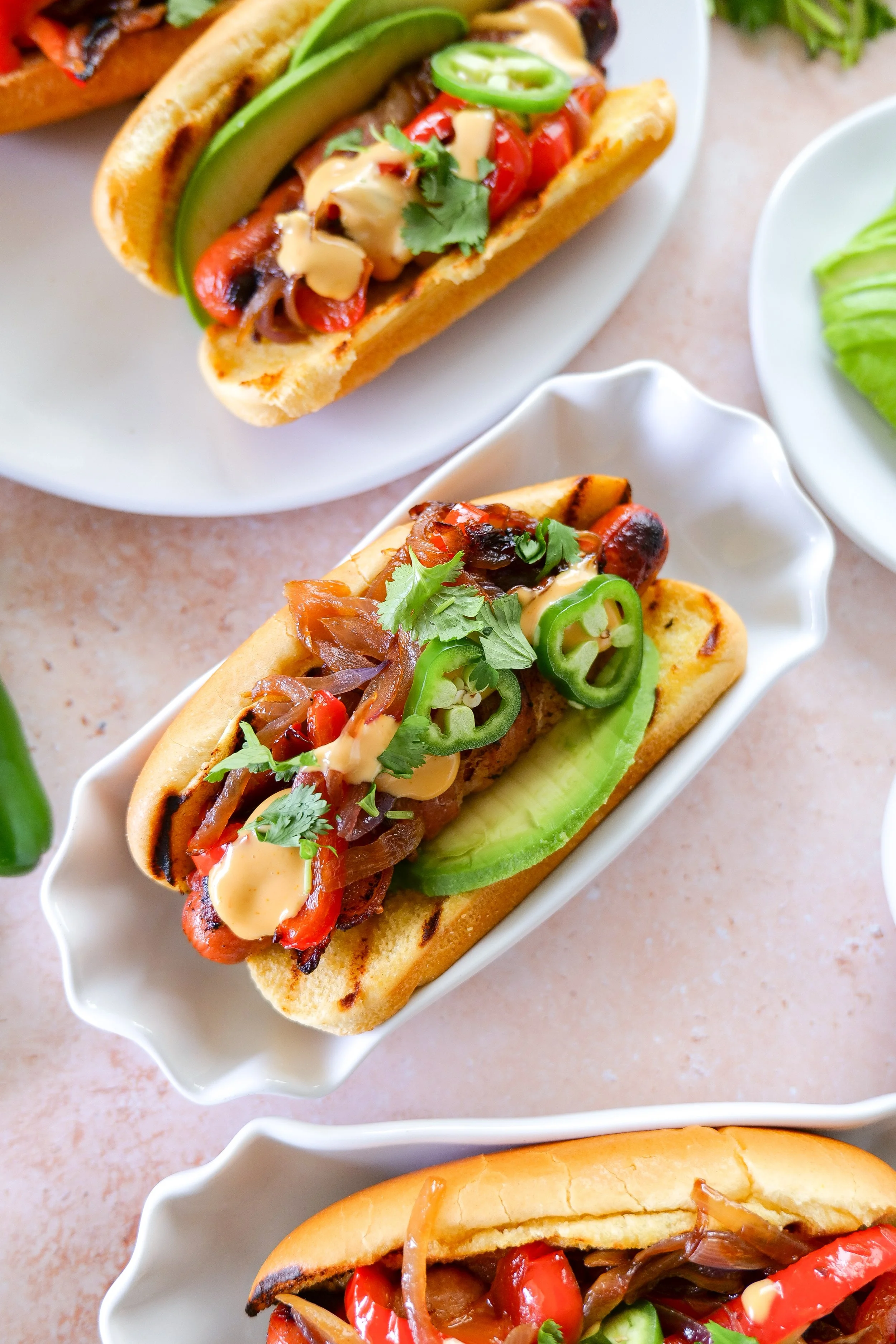 Patriotic summer meal featuring bacon-wrapped hot dogs
