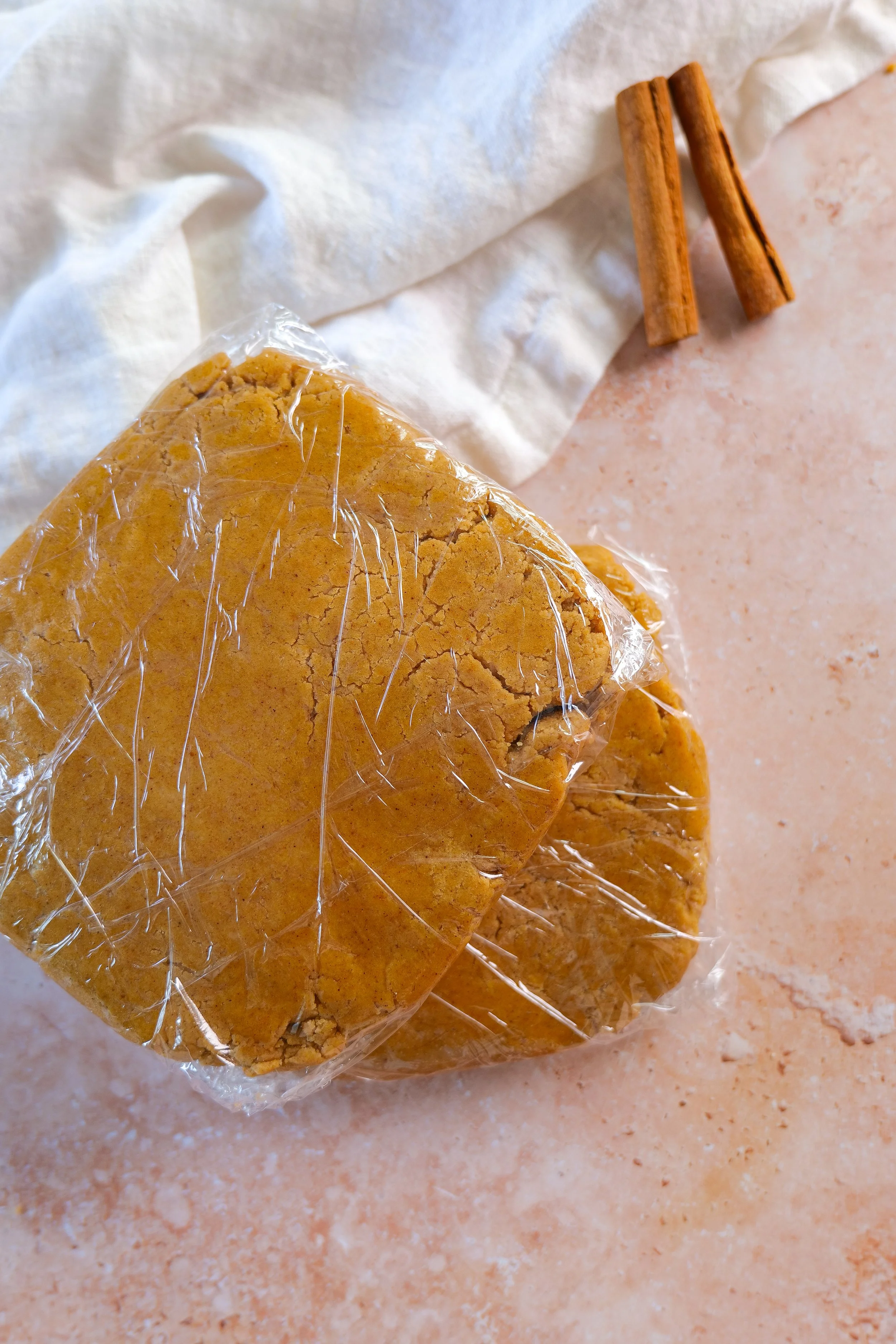 Pumpkin cookie dough prepared for chilling before rolling and cutting