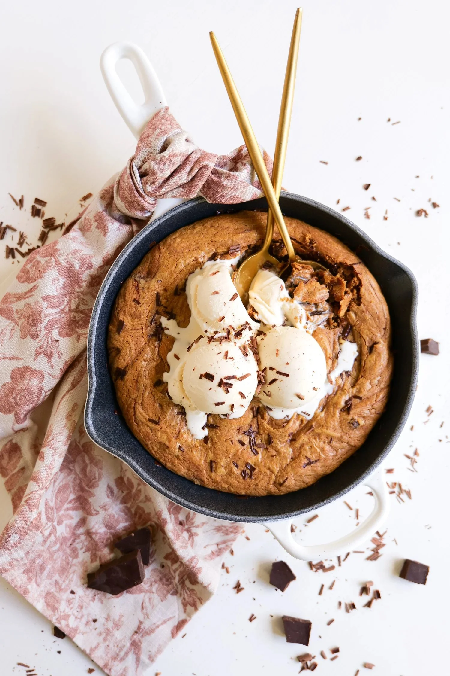 Warm brown butter pumpkin chocolate chip cookie skillet for a cozy fall dessert.