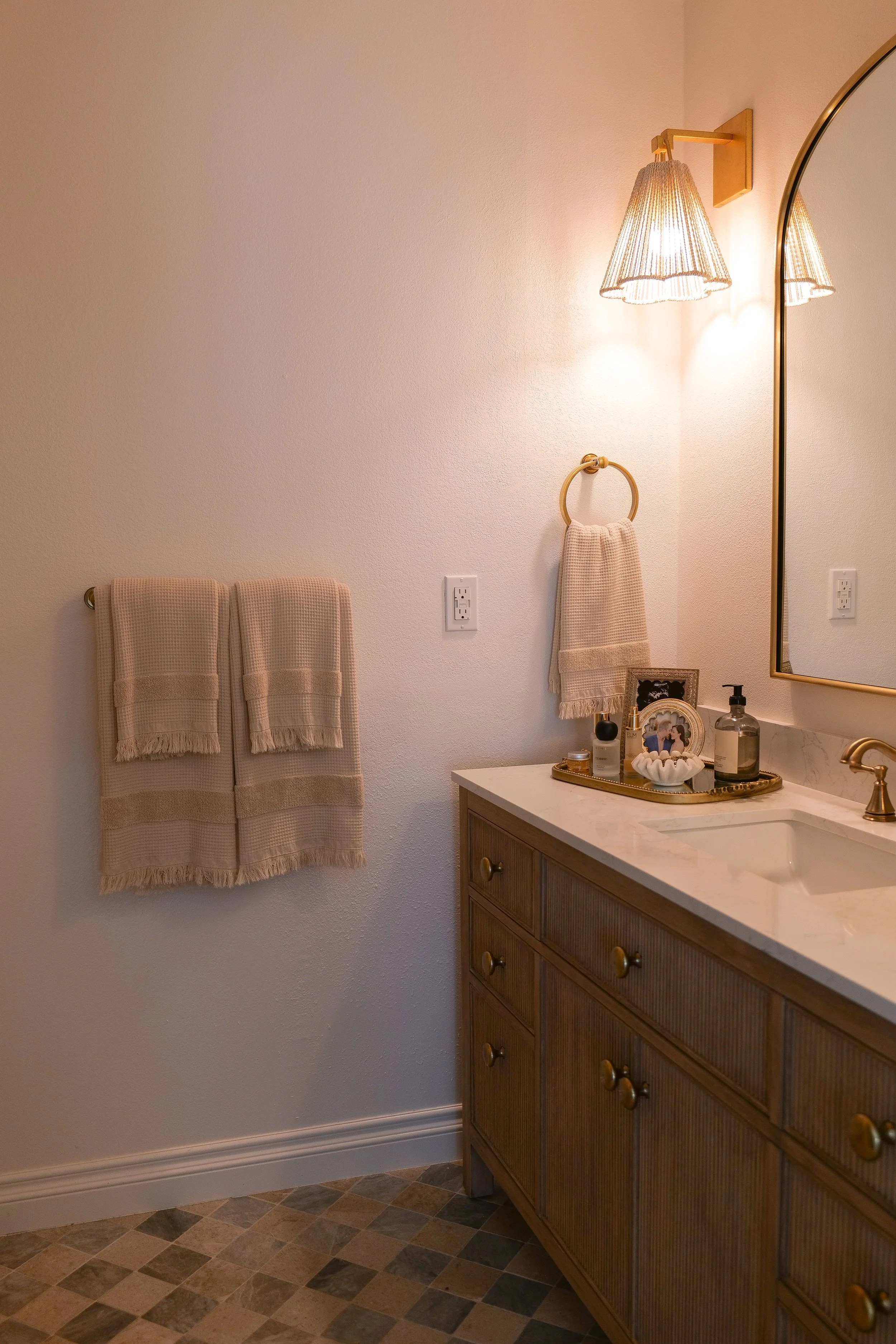 Wayfair bathroom vanity with upgraded Emtek cabinet knobs.