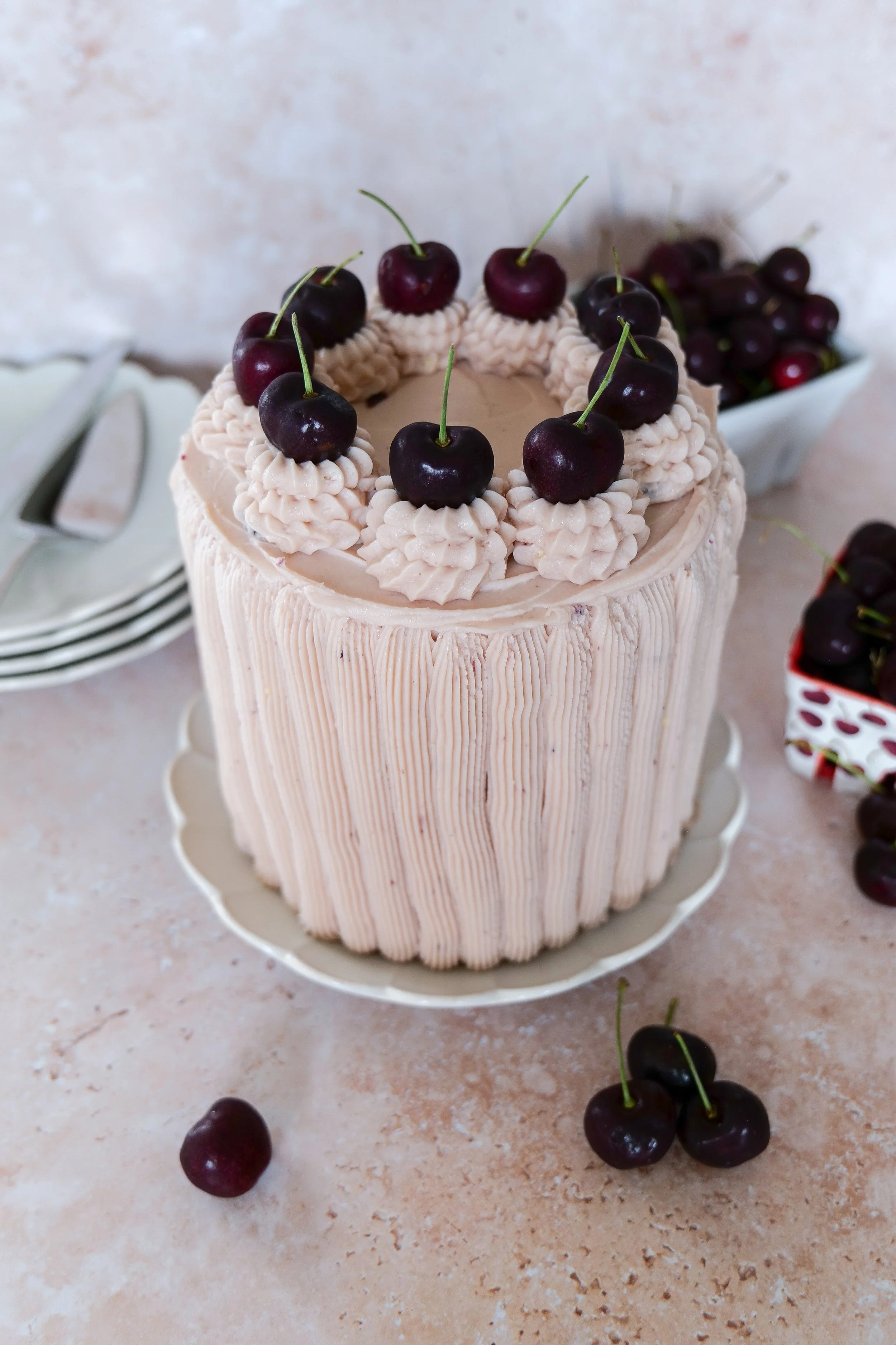 Easy vanilla bean cherry cake recipe made with fresh cherries and creamy buttercream frosting.  7.