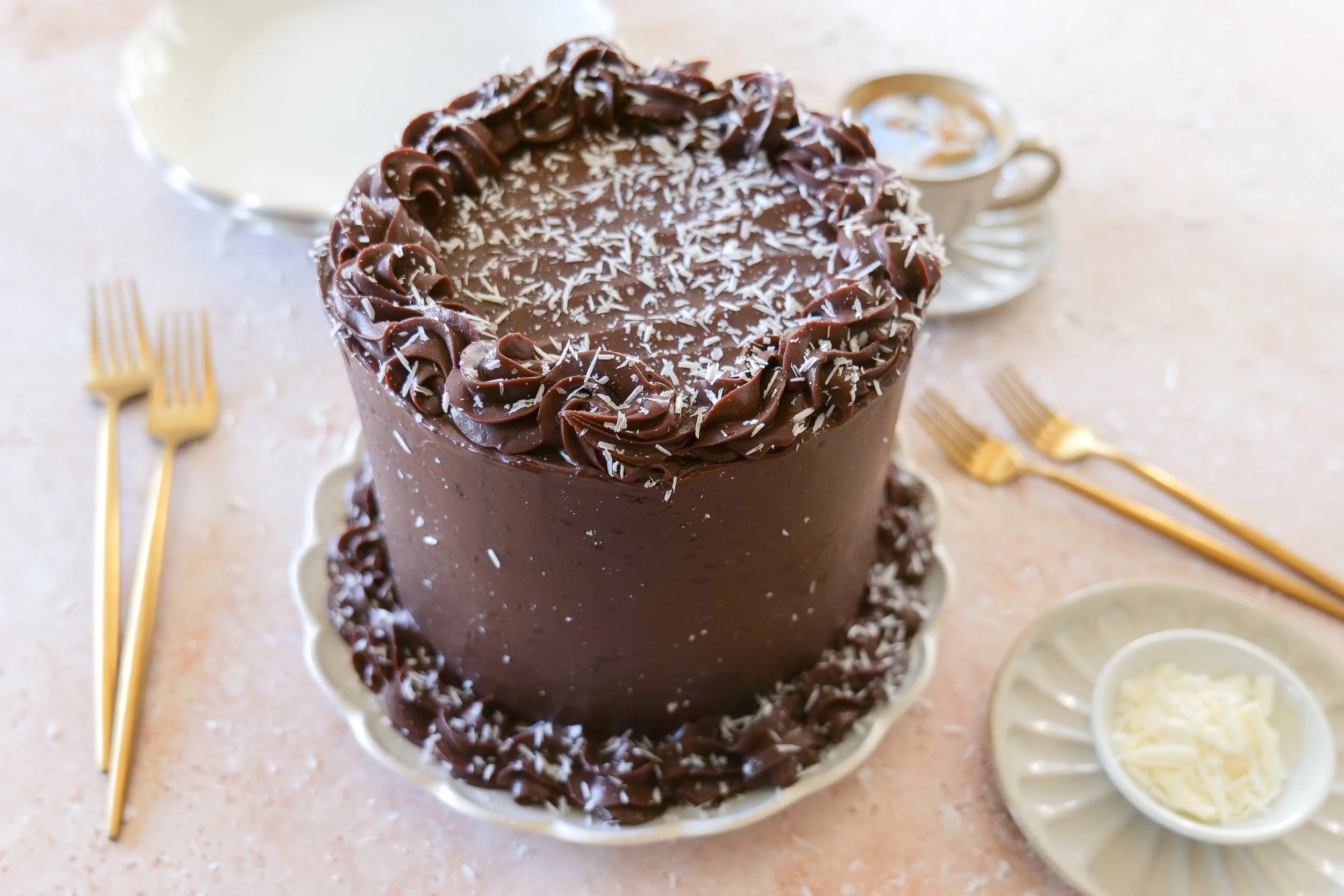 Decadent chocolate Tuxedo Cake showing contrasting dark chocolate cake and creamy mousse layers.